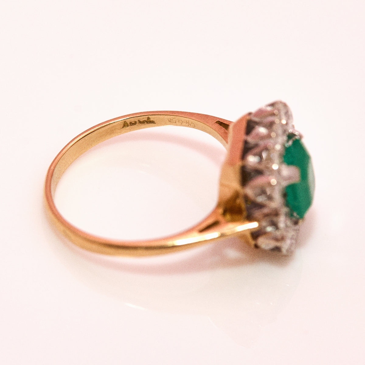 18ct gold emerald and diamond cluster ring