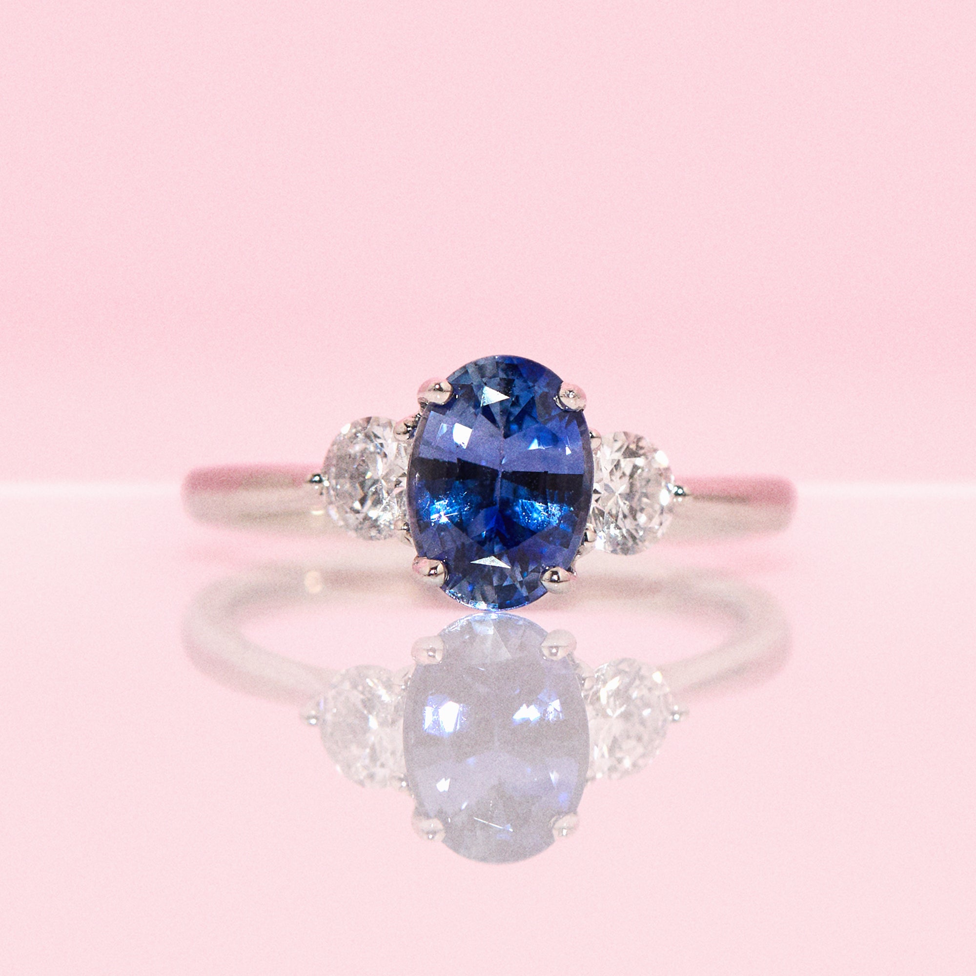 Platinum 1.57ct blue sapphire and diamond three stone ring (made to order)