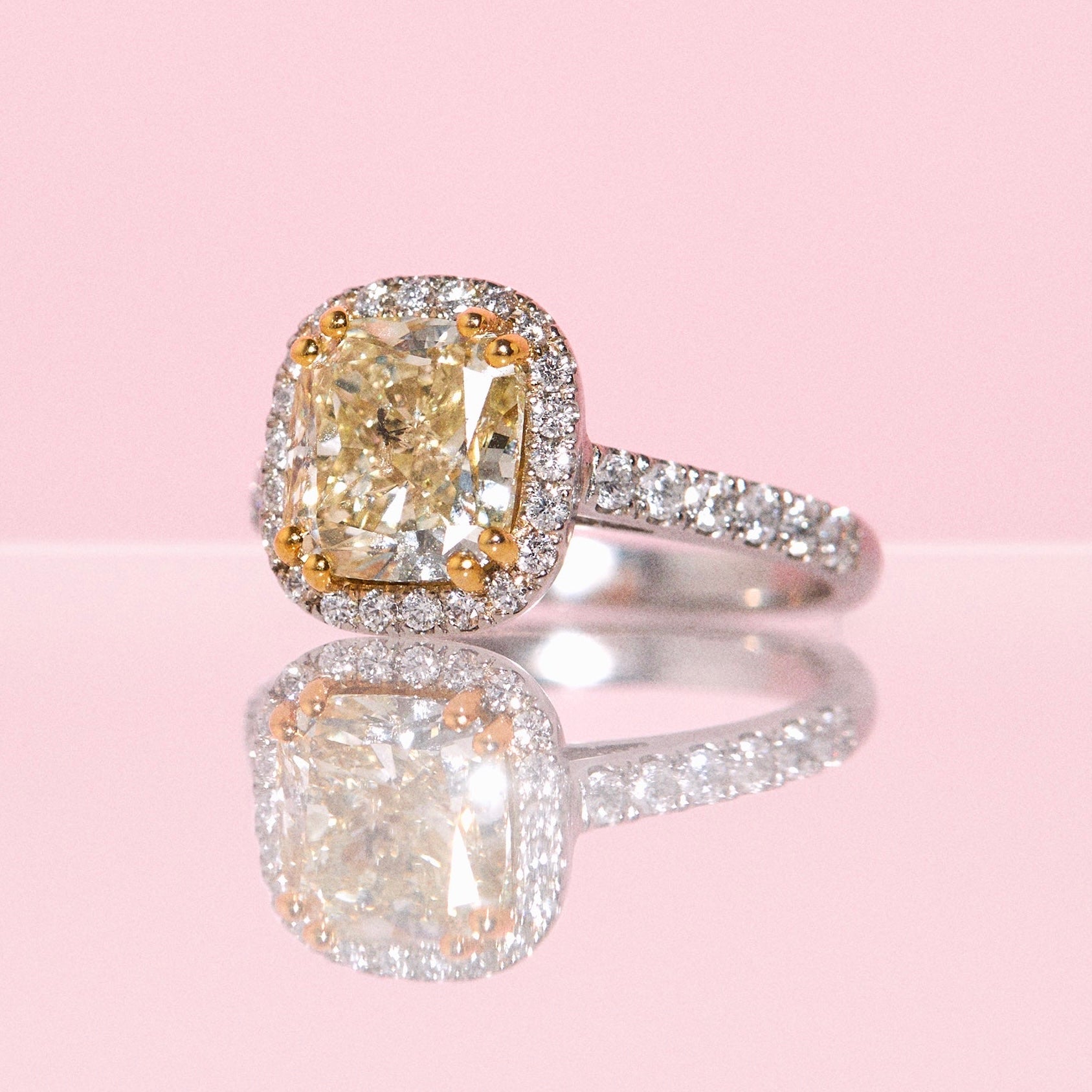 Platinum 3.0ct cushion cut yellow diamond halo ring
