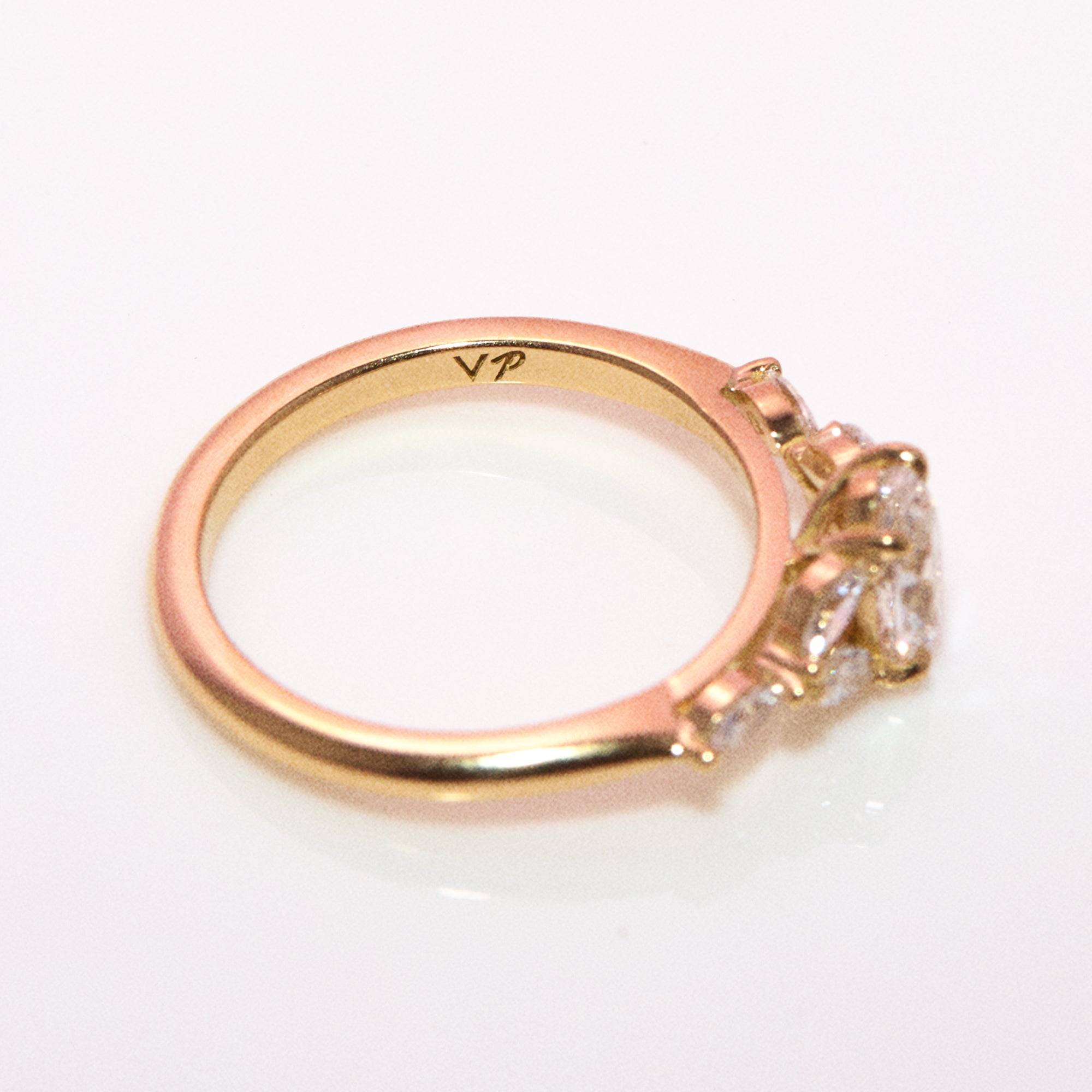 18ct gold 0.70ct oval diamond cluster ring (made to order)