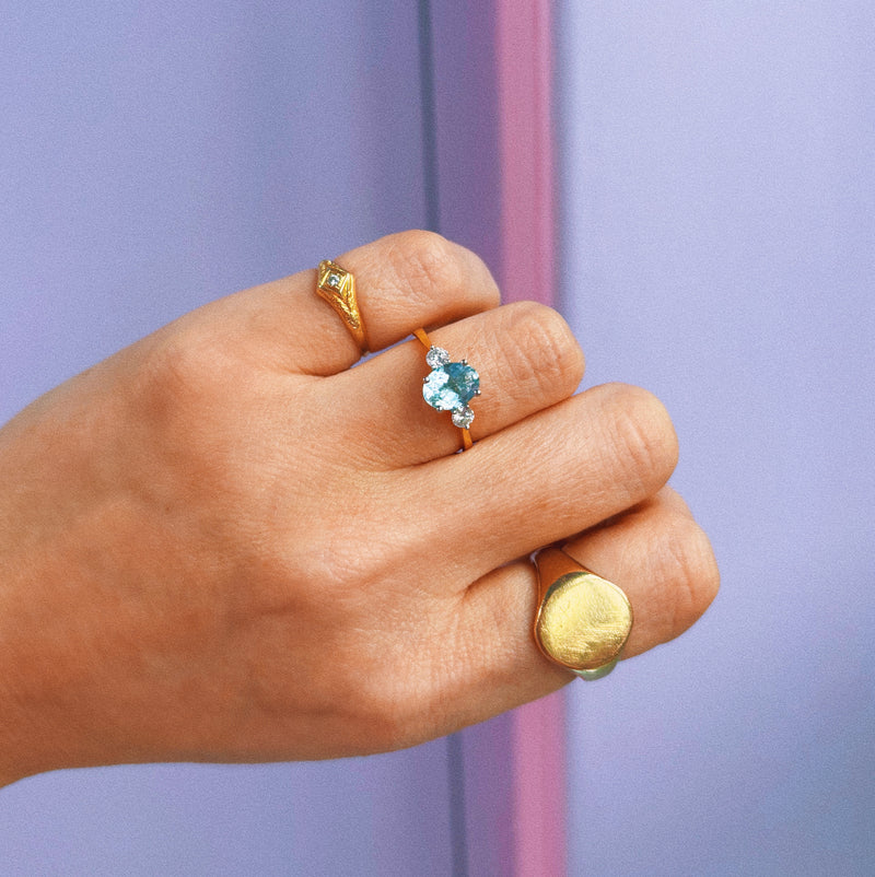 18ct gold aquamarine and diamond three stone ring