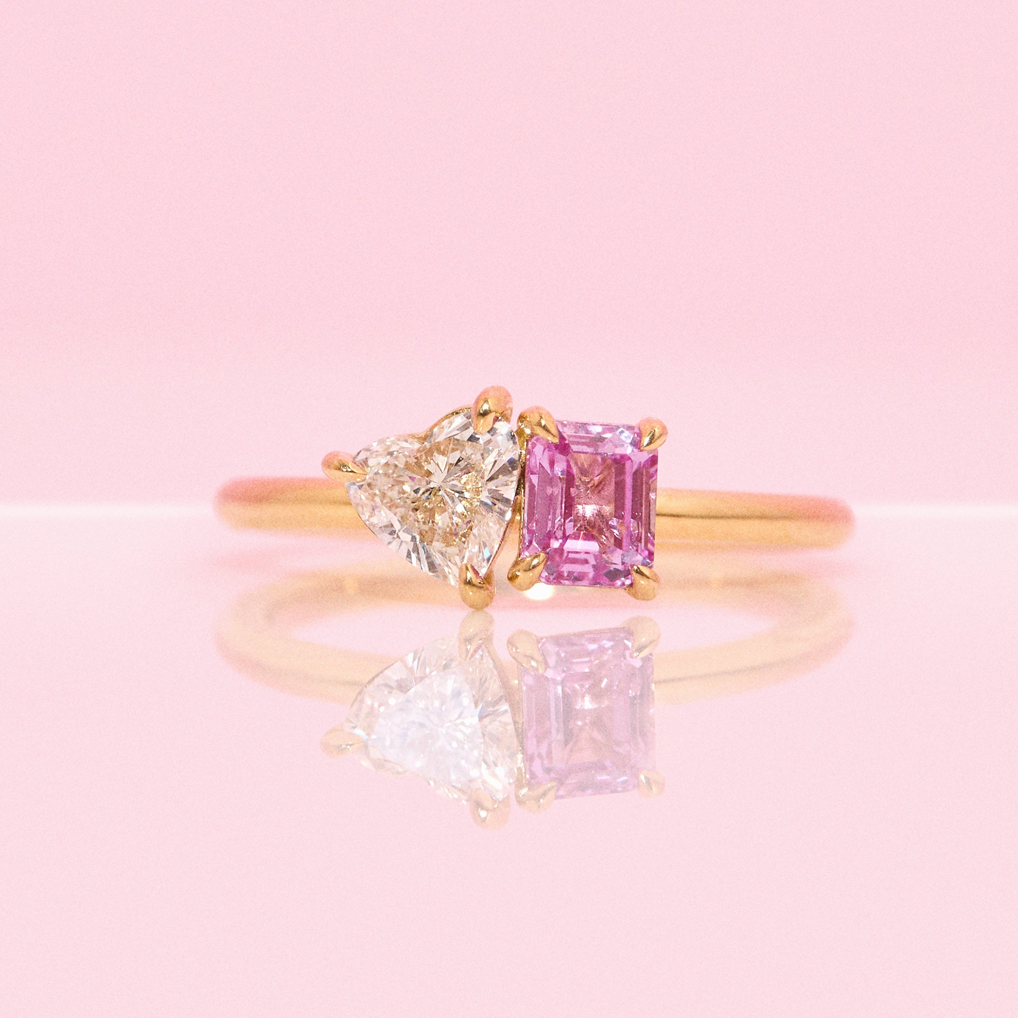 18ct gold ‘toi et moi’ 0.46ct heart-shaped diamond and 0.60ct pink sapphire ring