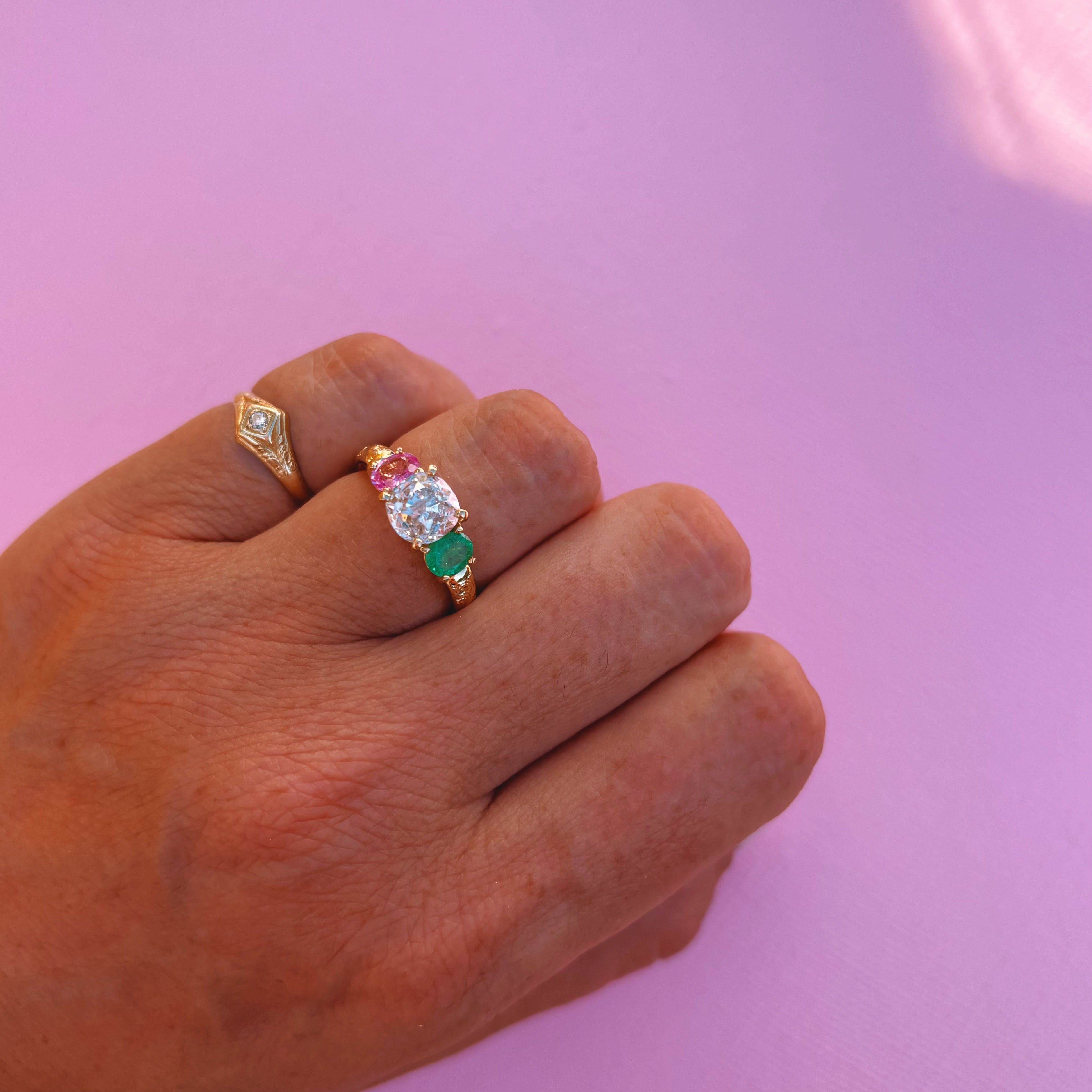 18ct yellow gold 1.569ct old cut vintage diamond, emerald and pink sapphire ‘Two Become One’ engraved ring