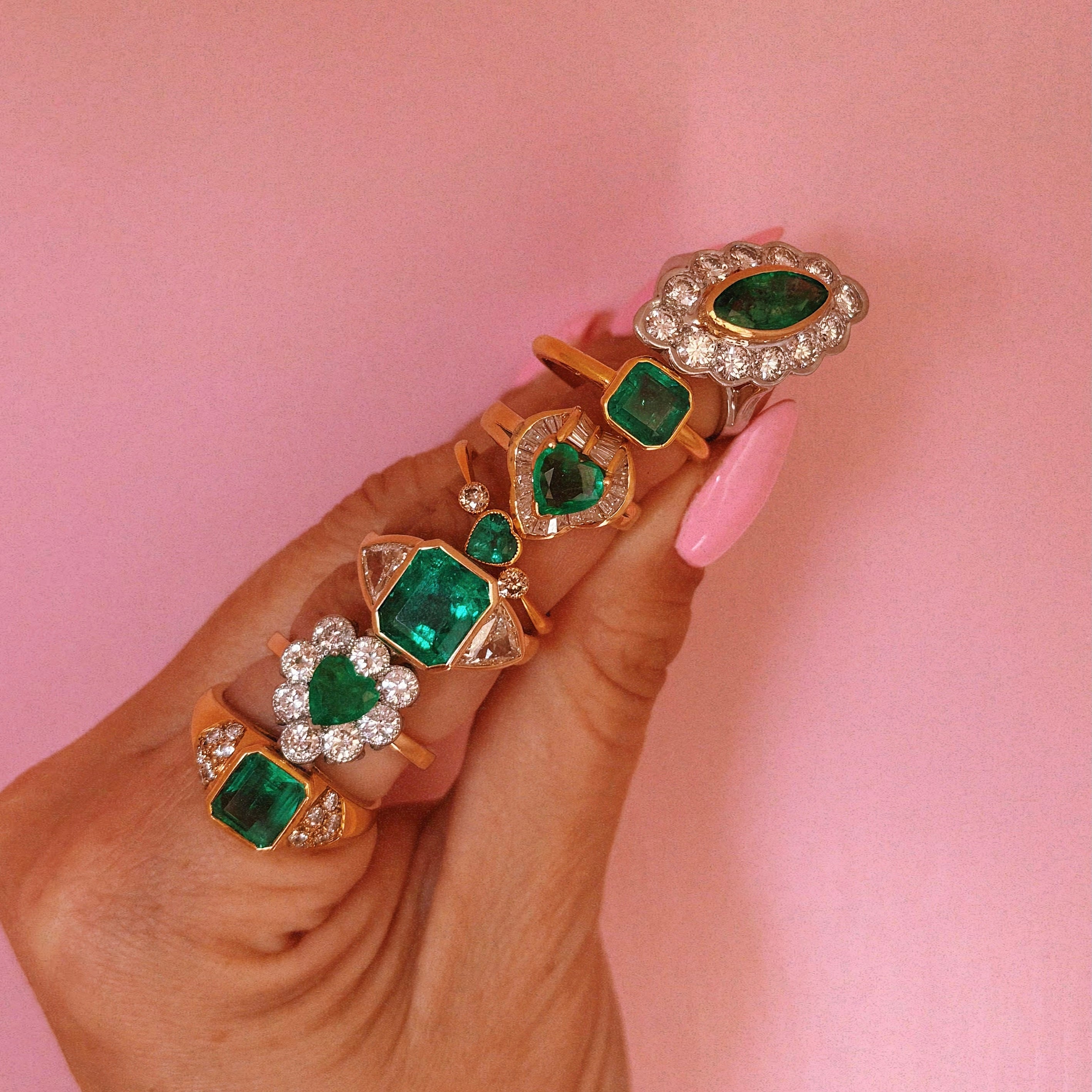 18ct white gold bezel set marquise emerald and diamond ring