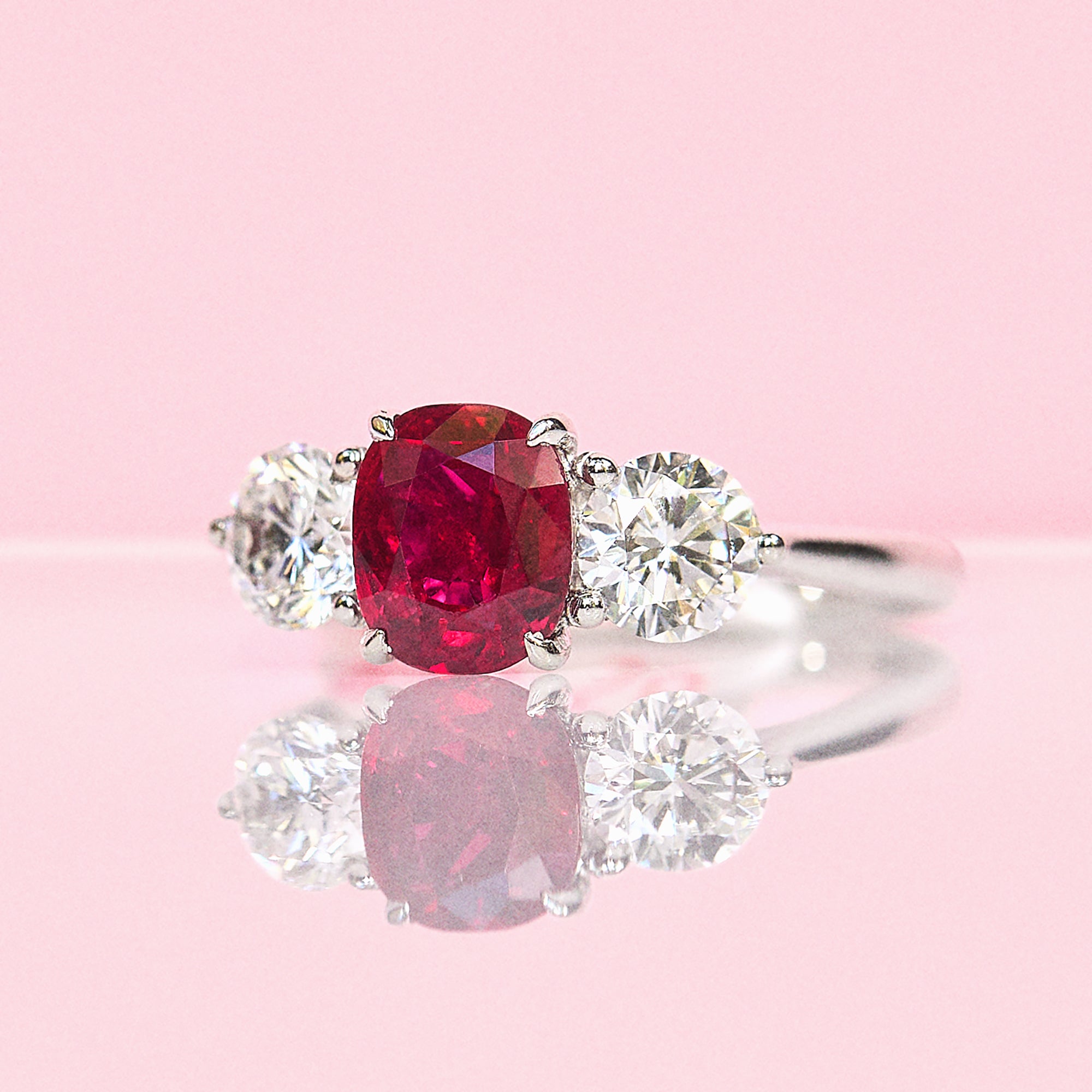 Platinum 1.50ct ruby and diamond three stone ring