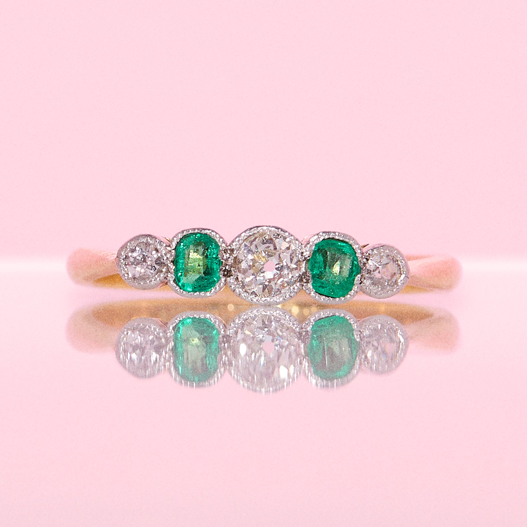 18ct gold Colombian emerald and old cut diamond half eternity ring