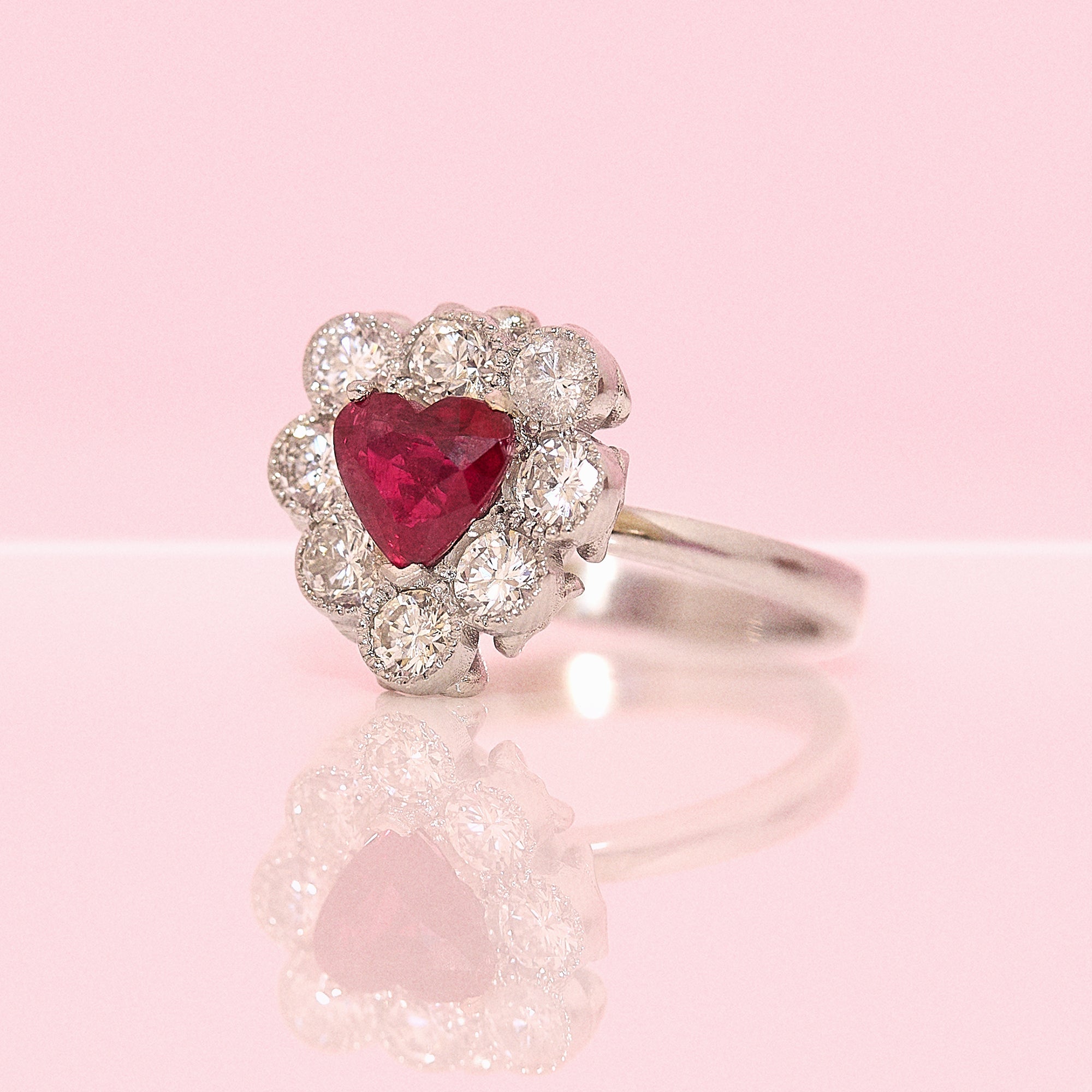 Platinum heart-shaped ruby and diamond vintage earring conversion ring