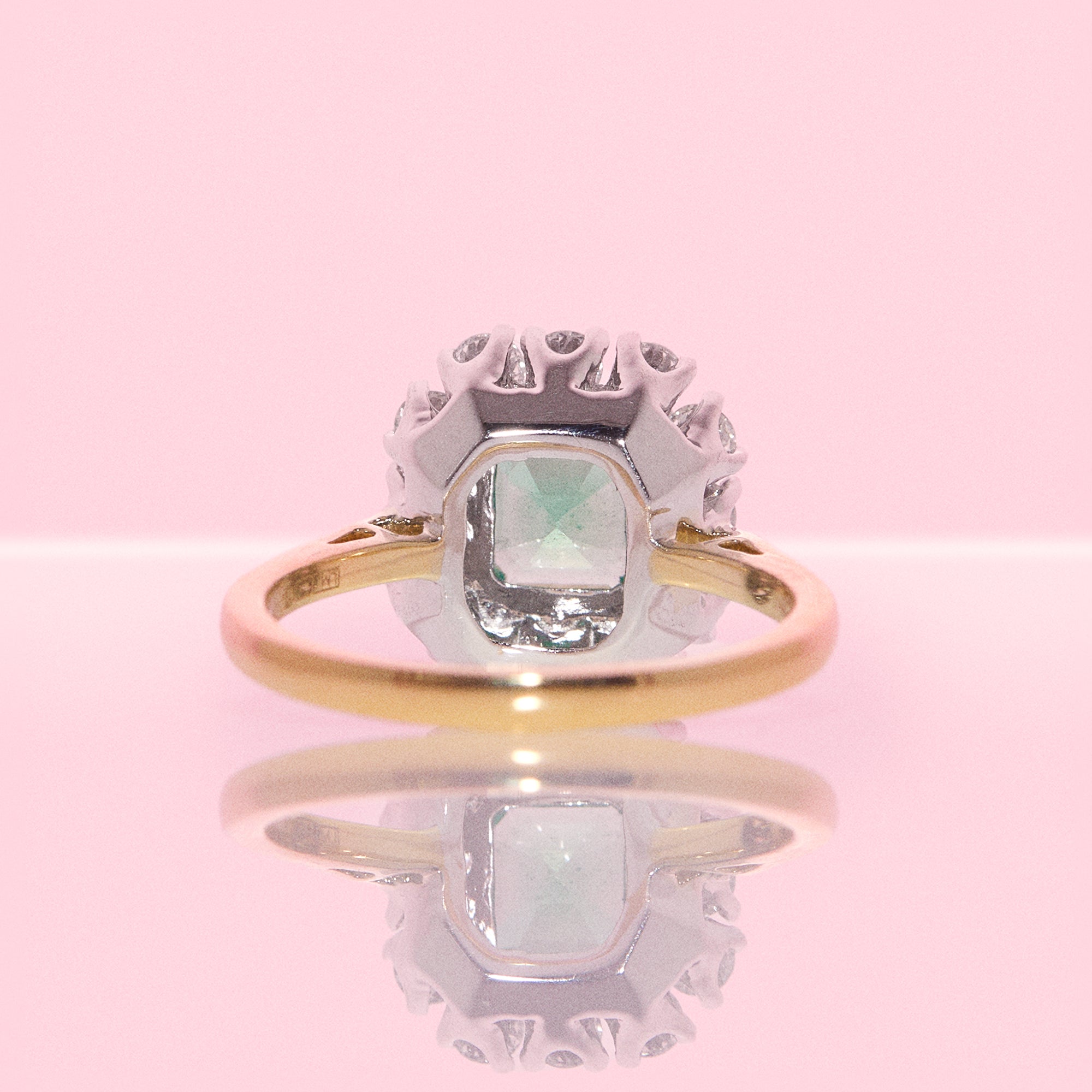 18ct gold emerald and diamond cluster ring