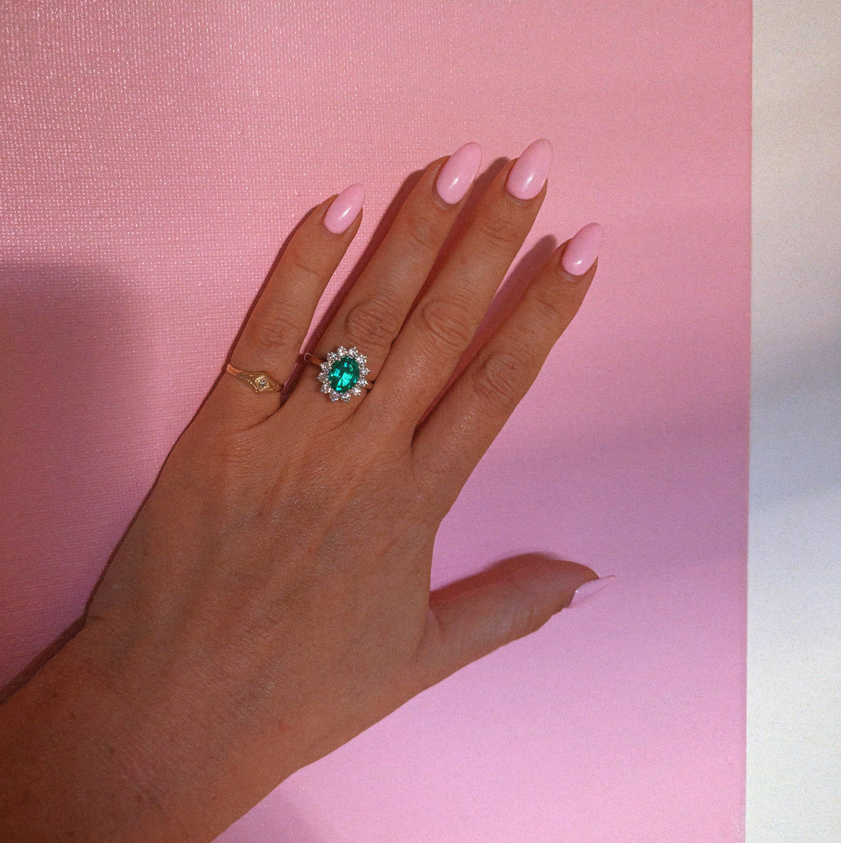 9ct gold 1.93ct oval emerald and 0.88ct diamond cluster ring (lab grown)