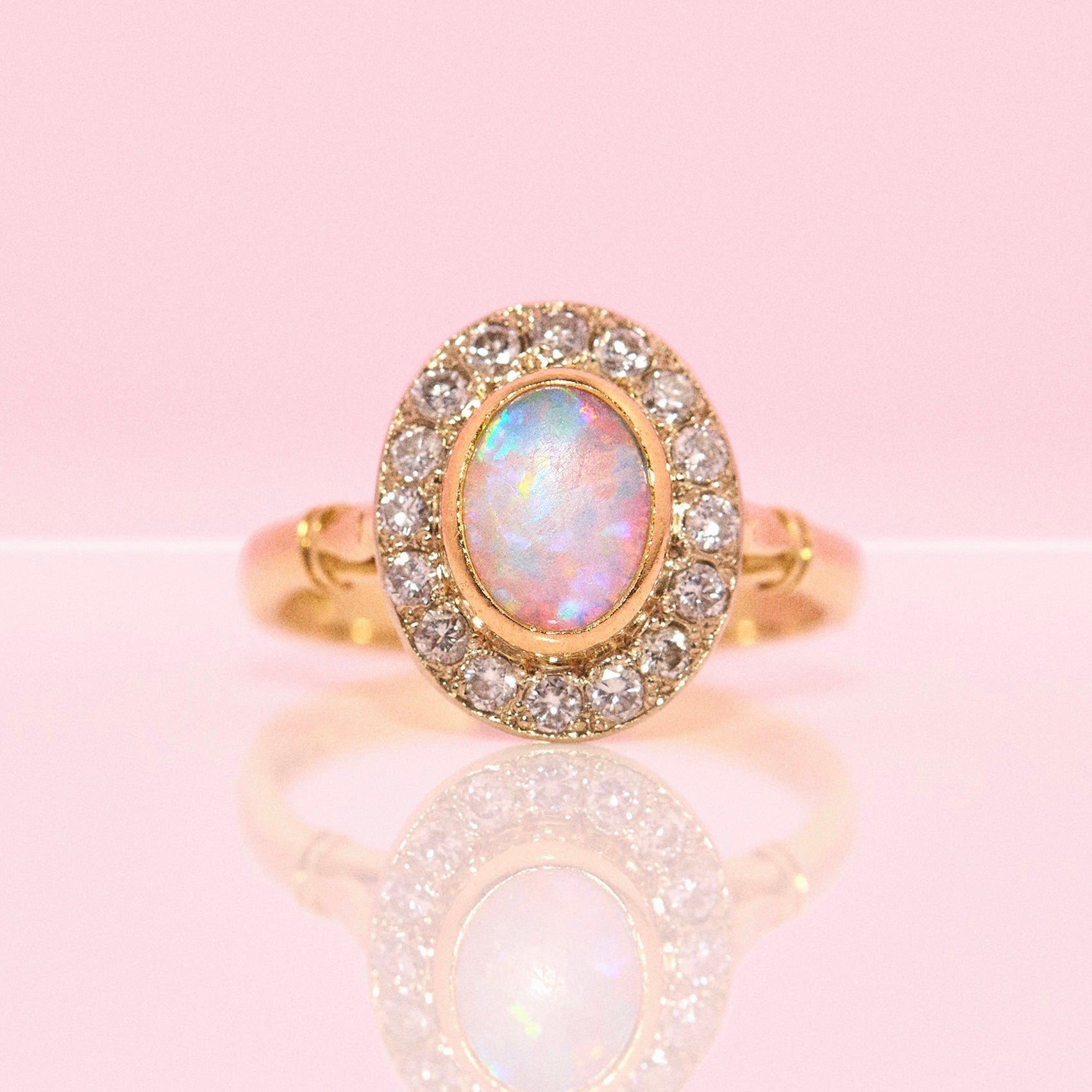 18ct gold bezel set opal and diamond ring from 1993