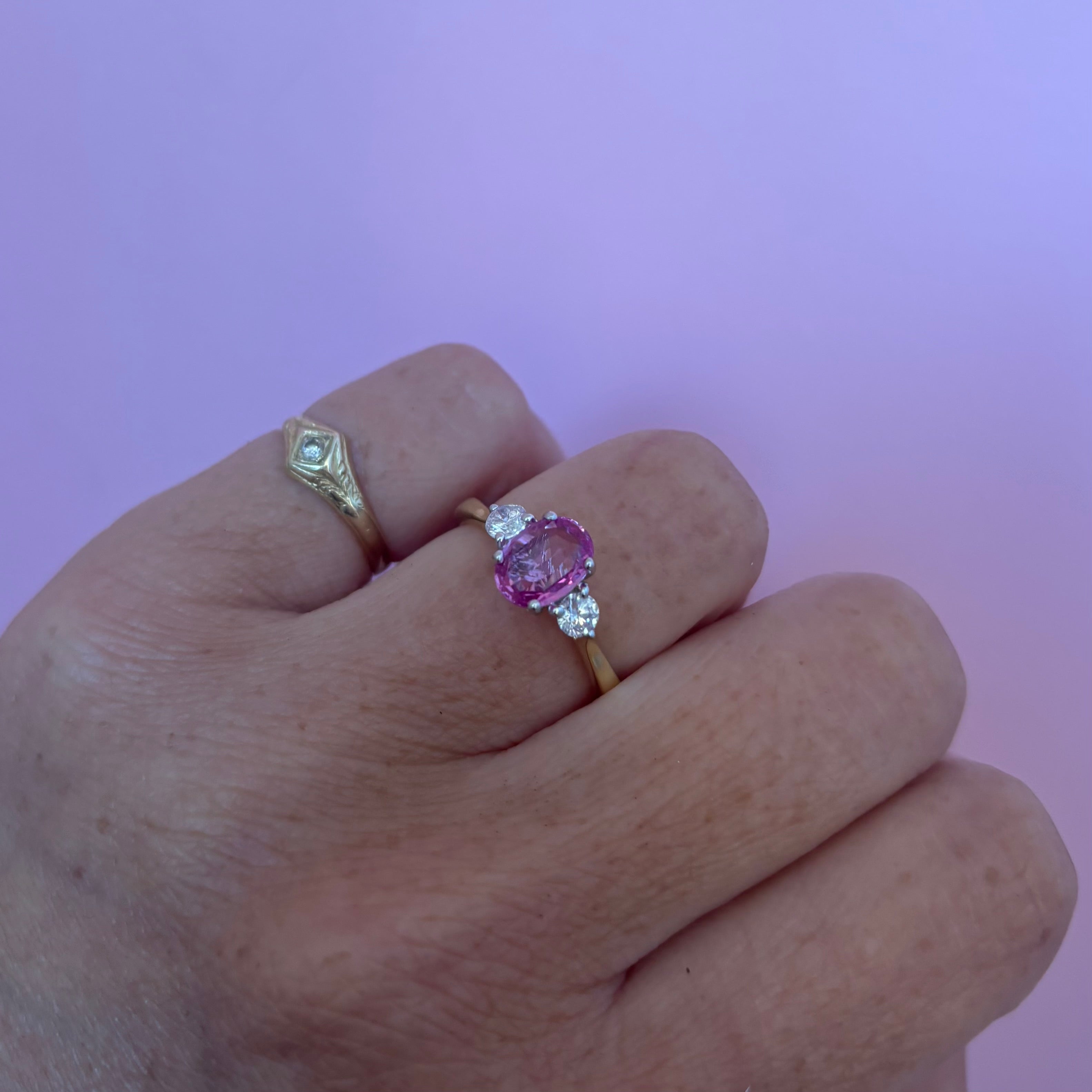 18ct gold 1.22ct pink sapphire and 0.25ct diamond three stone ring