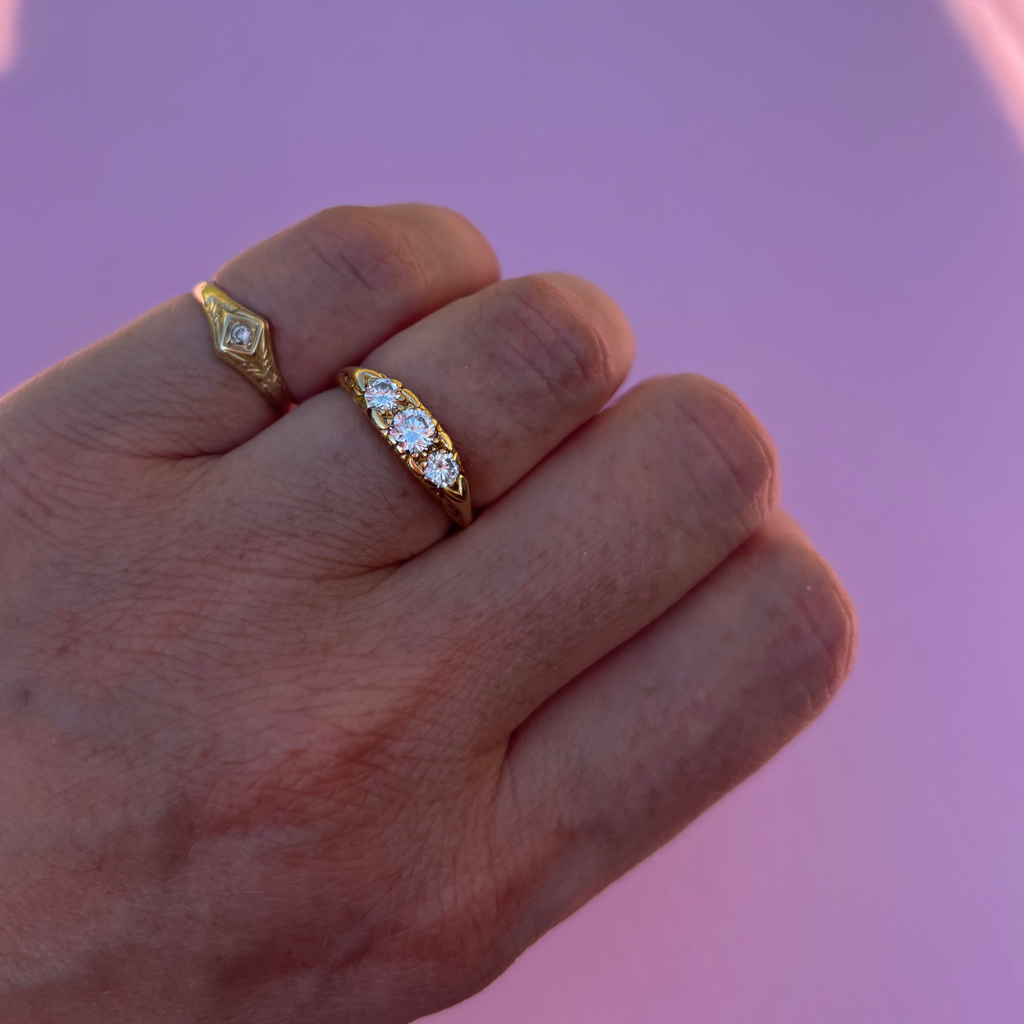 18ct gold diamond three stone carved ring from 1991