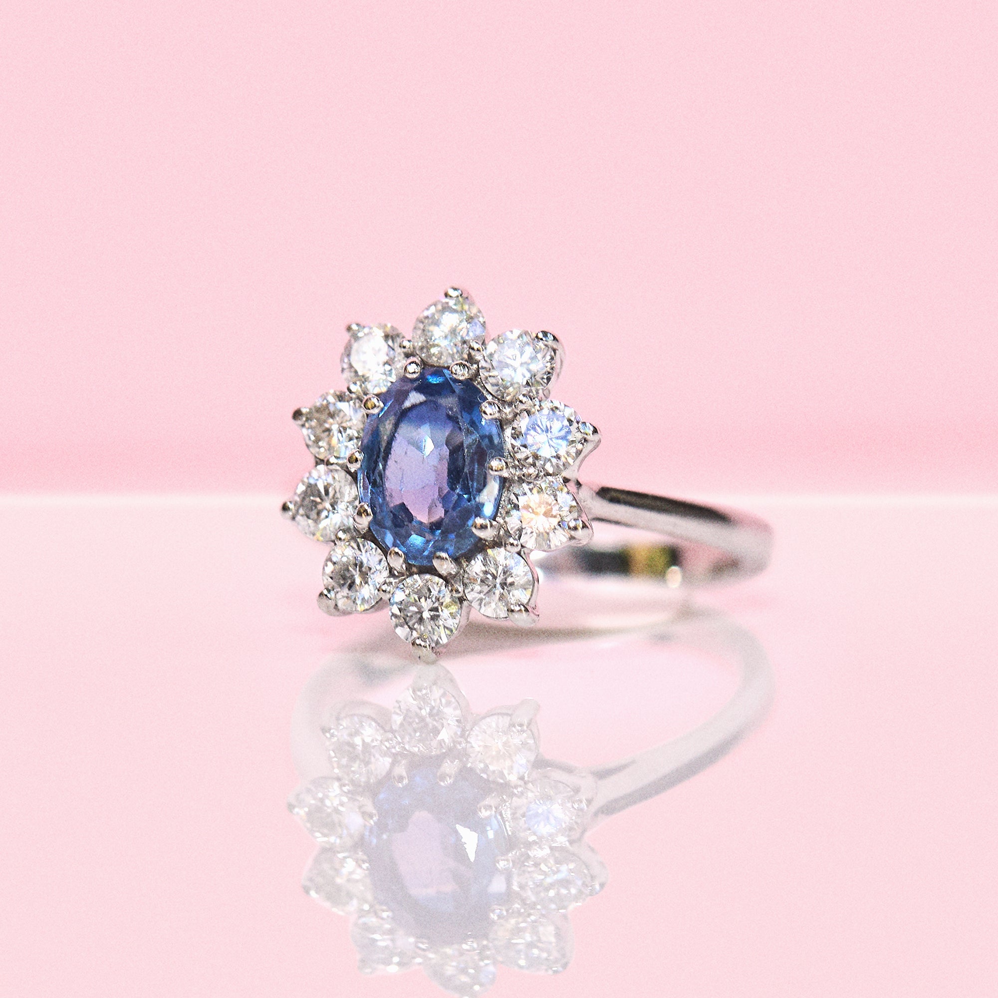 18ct white gold 1.0ct sapphire and diamond cluster ring