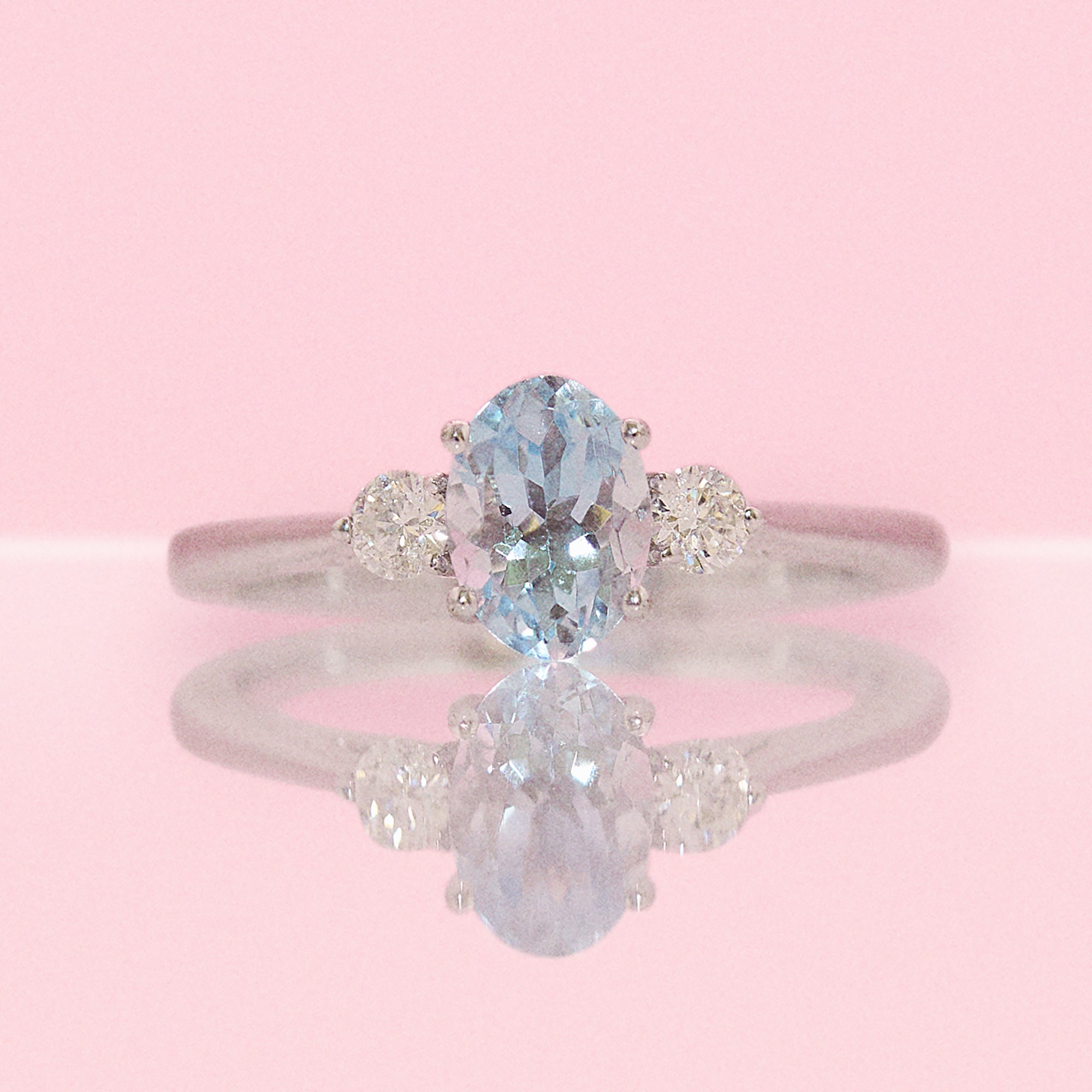 9ct white gold 1.03ct aquamarine and 0.16ct diamond three stone ring