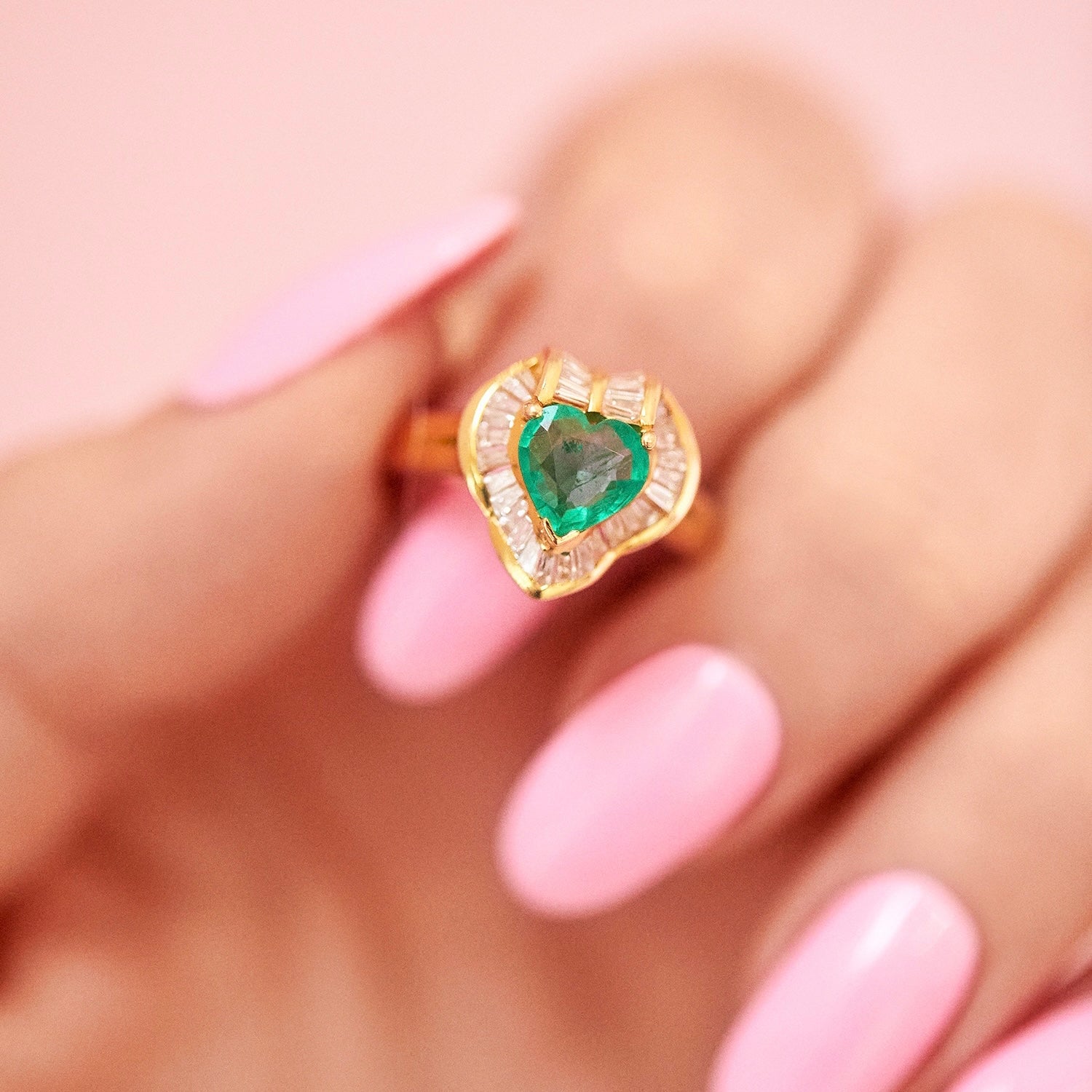 18ct gold heart shaped emerald and baguette diamond ring