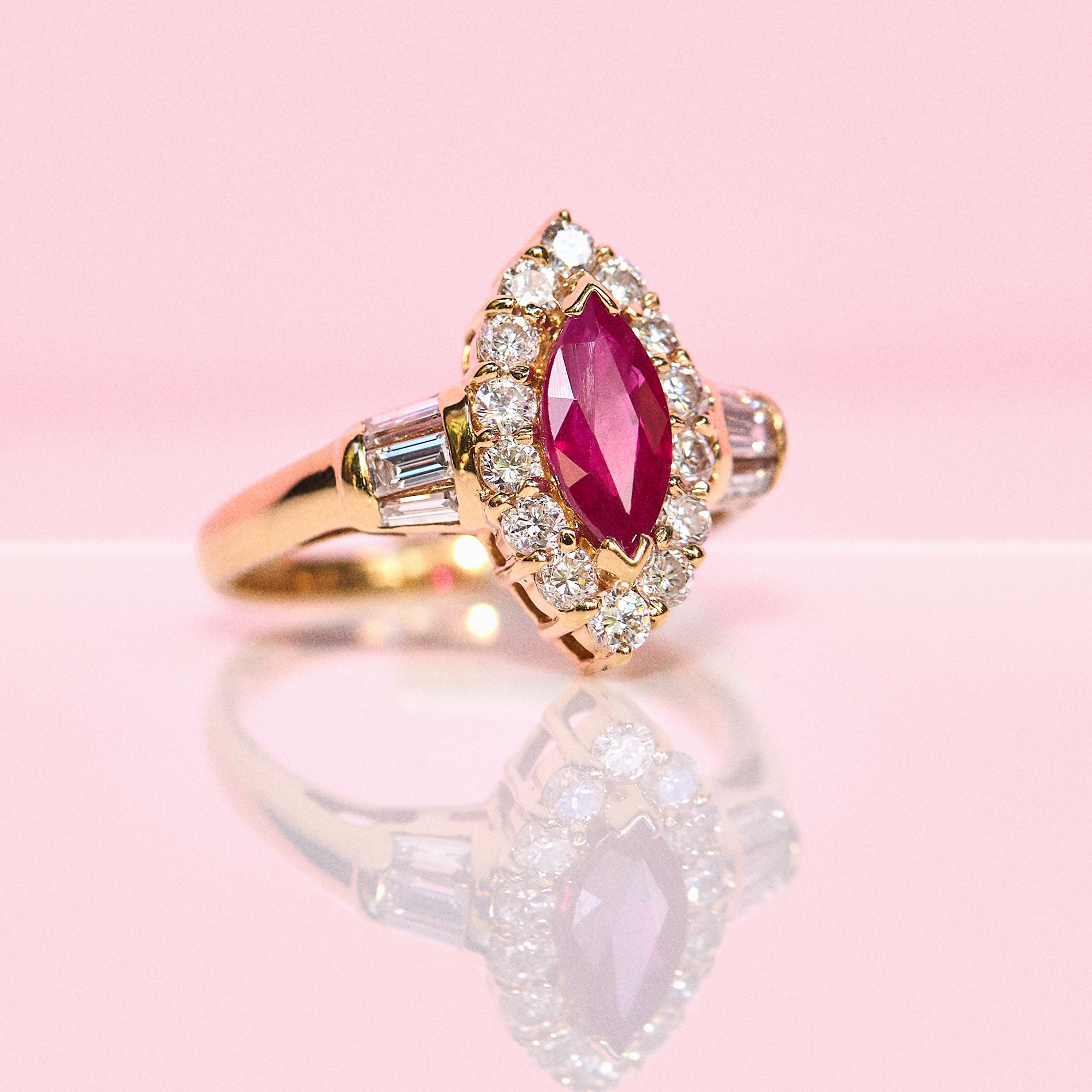 18ct gold 1.08ct marquise cut ruby and diamond cluster ring