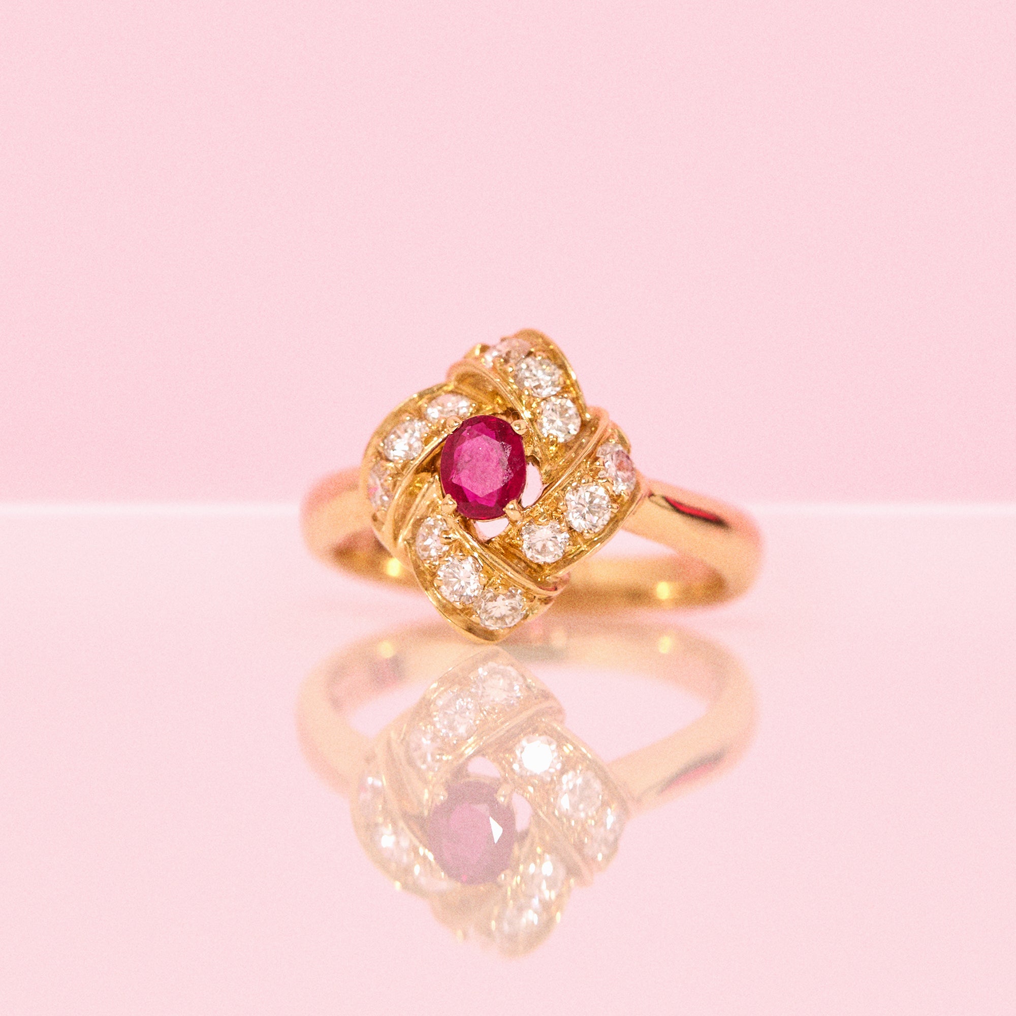 18ct gold ruby and diamond cluster ring