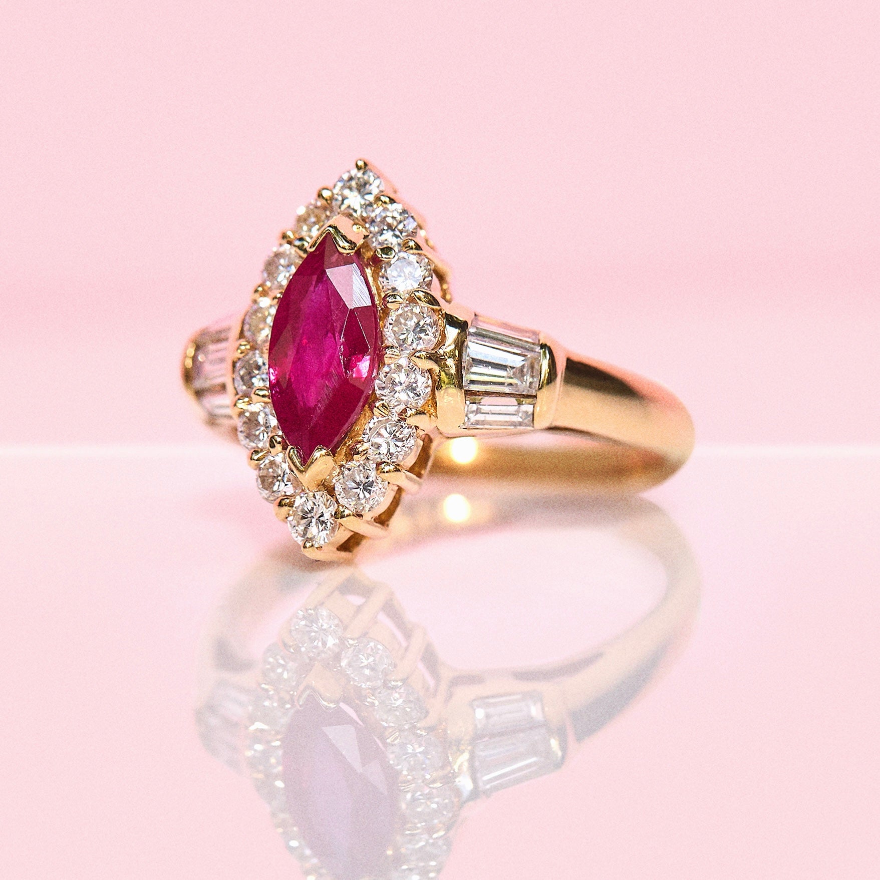18ct gold 1.08ct marquise cut ruby and diamond cluster ring