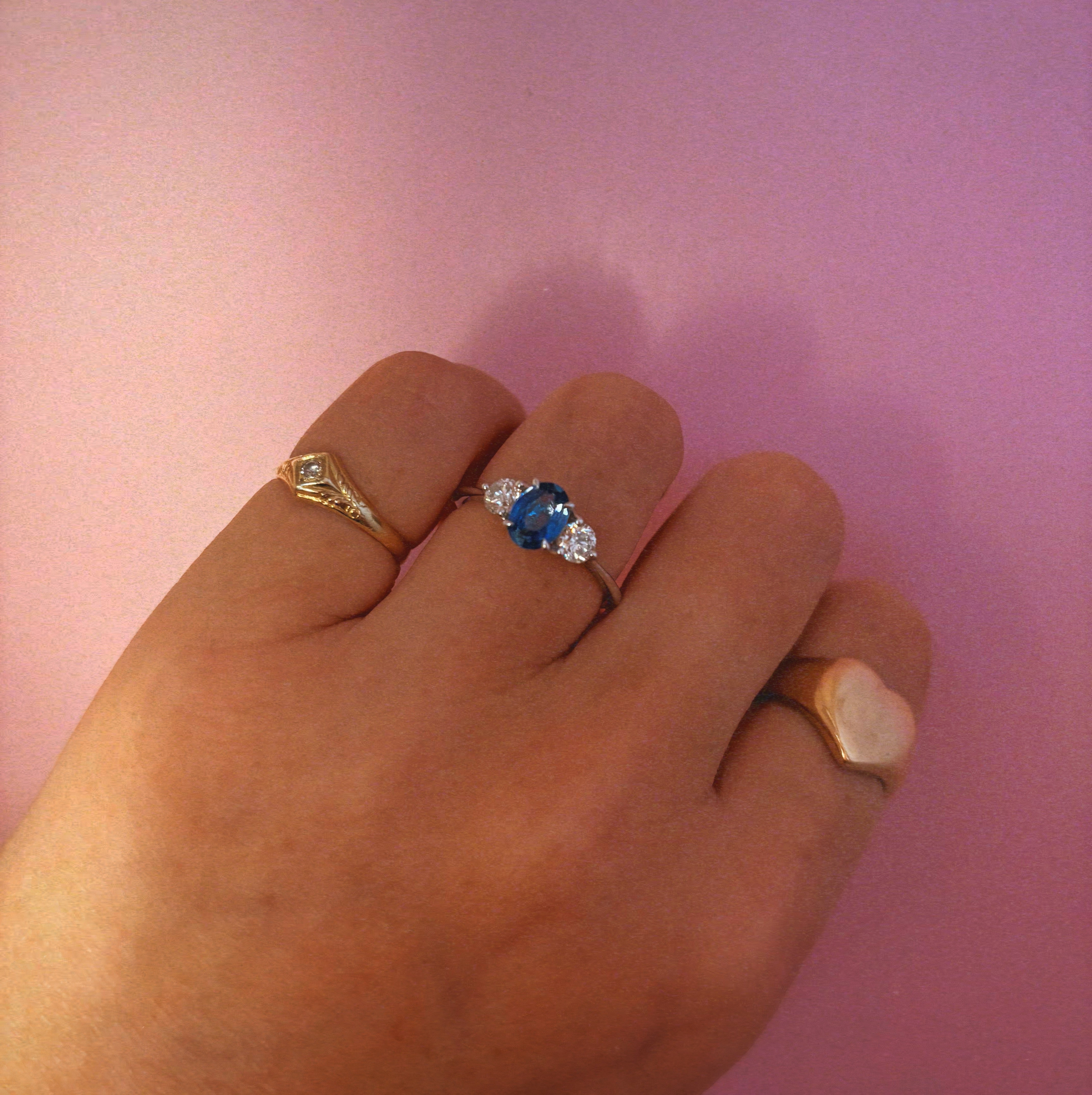 Platinum 0.84ct blue sapphire and diamond three stone ring (made to order)