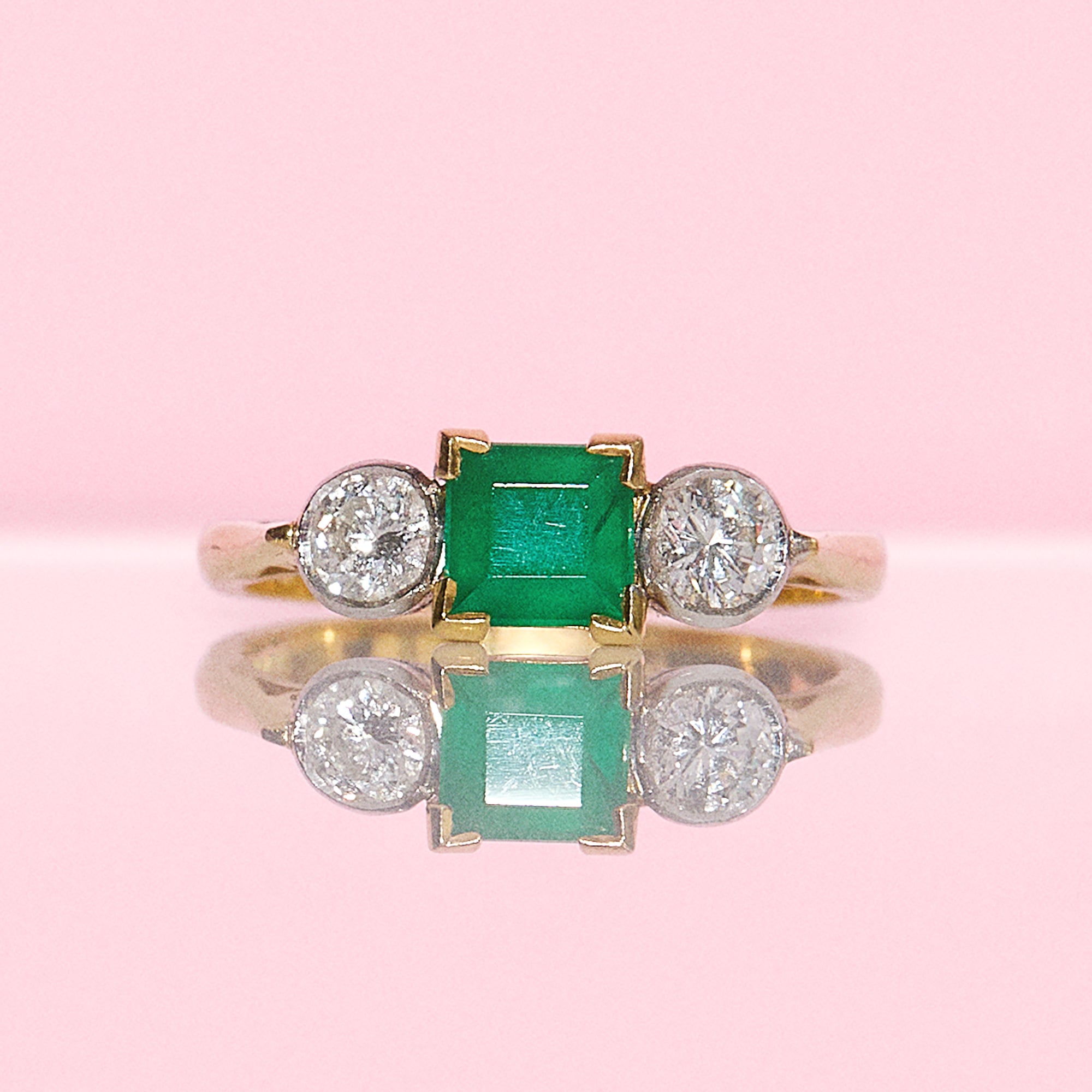 18ct gold square emerald and diamond three stone ring