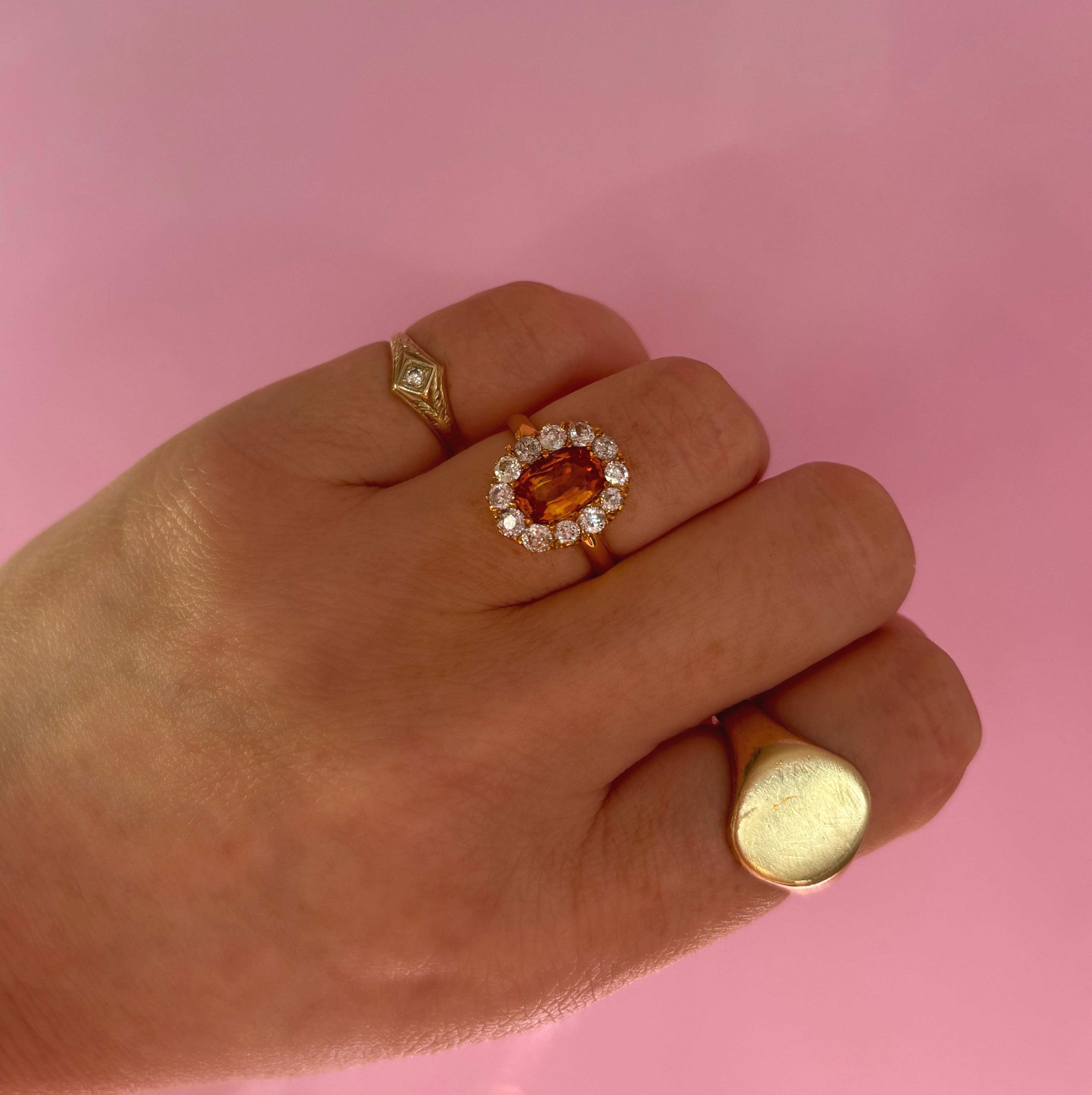 18ct gold orange sapphire and diamond cluster ring