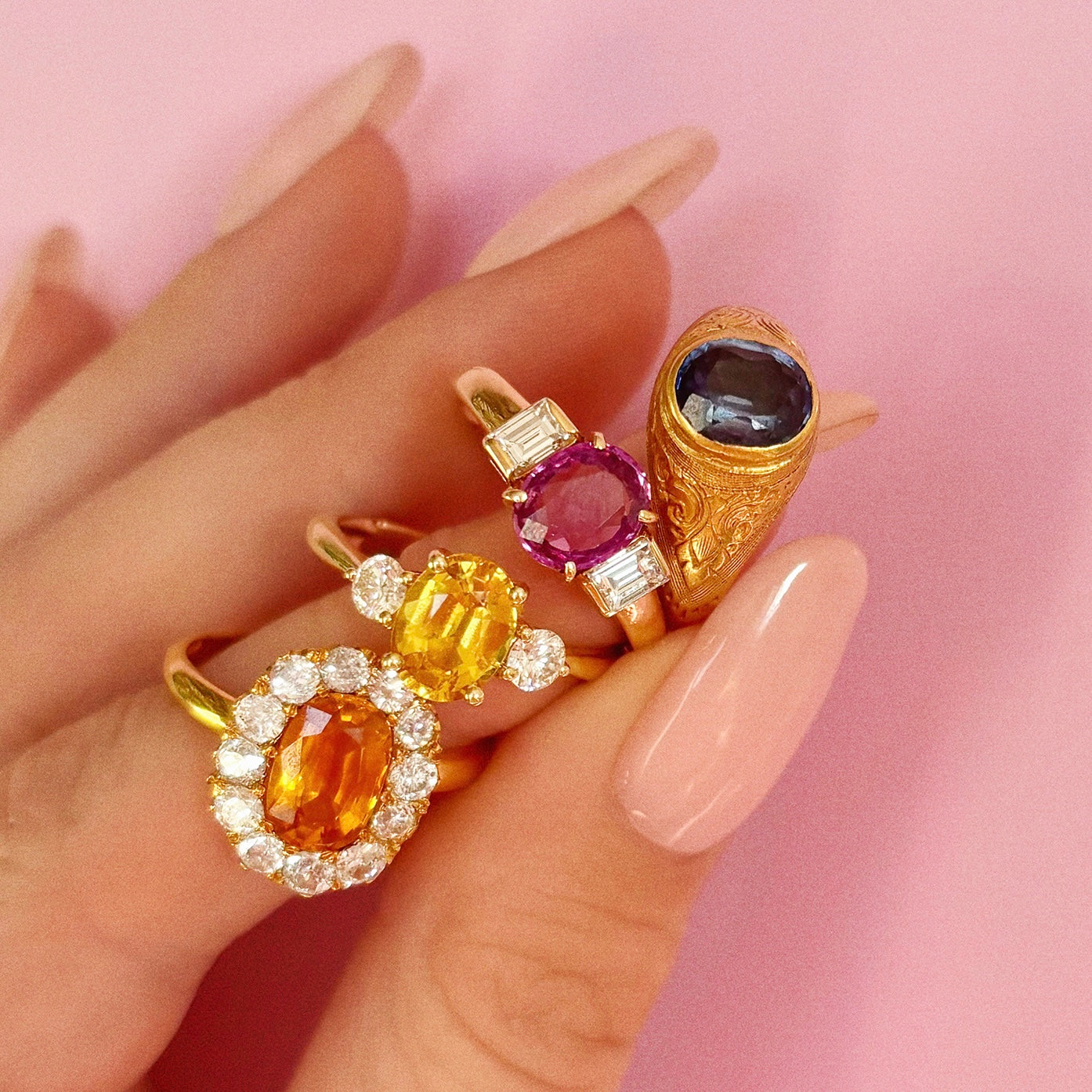 18ct gold pink sapphire and diamond three stone ring