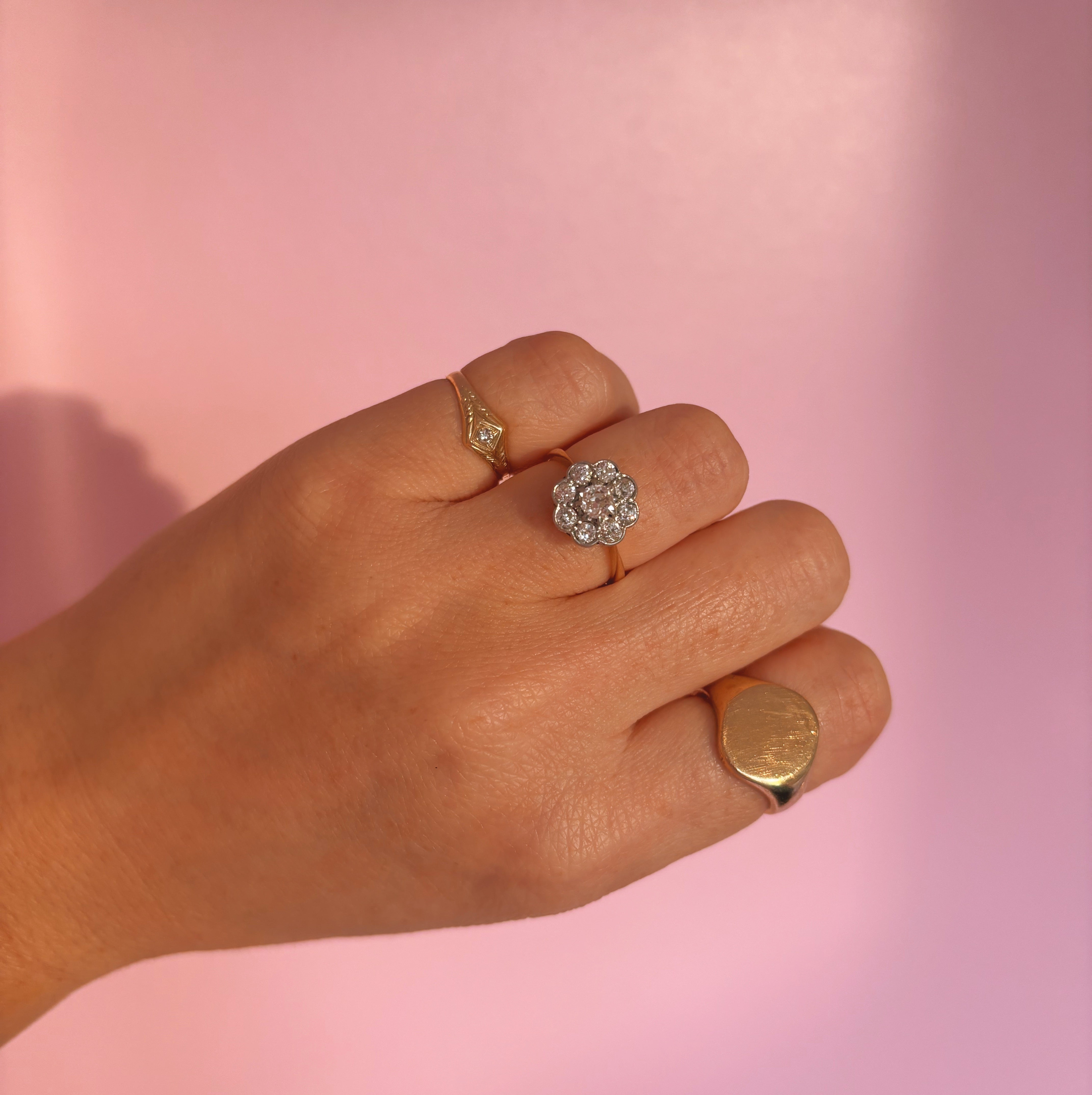 18ct gold old cut diamond flower ring from 1931