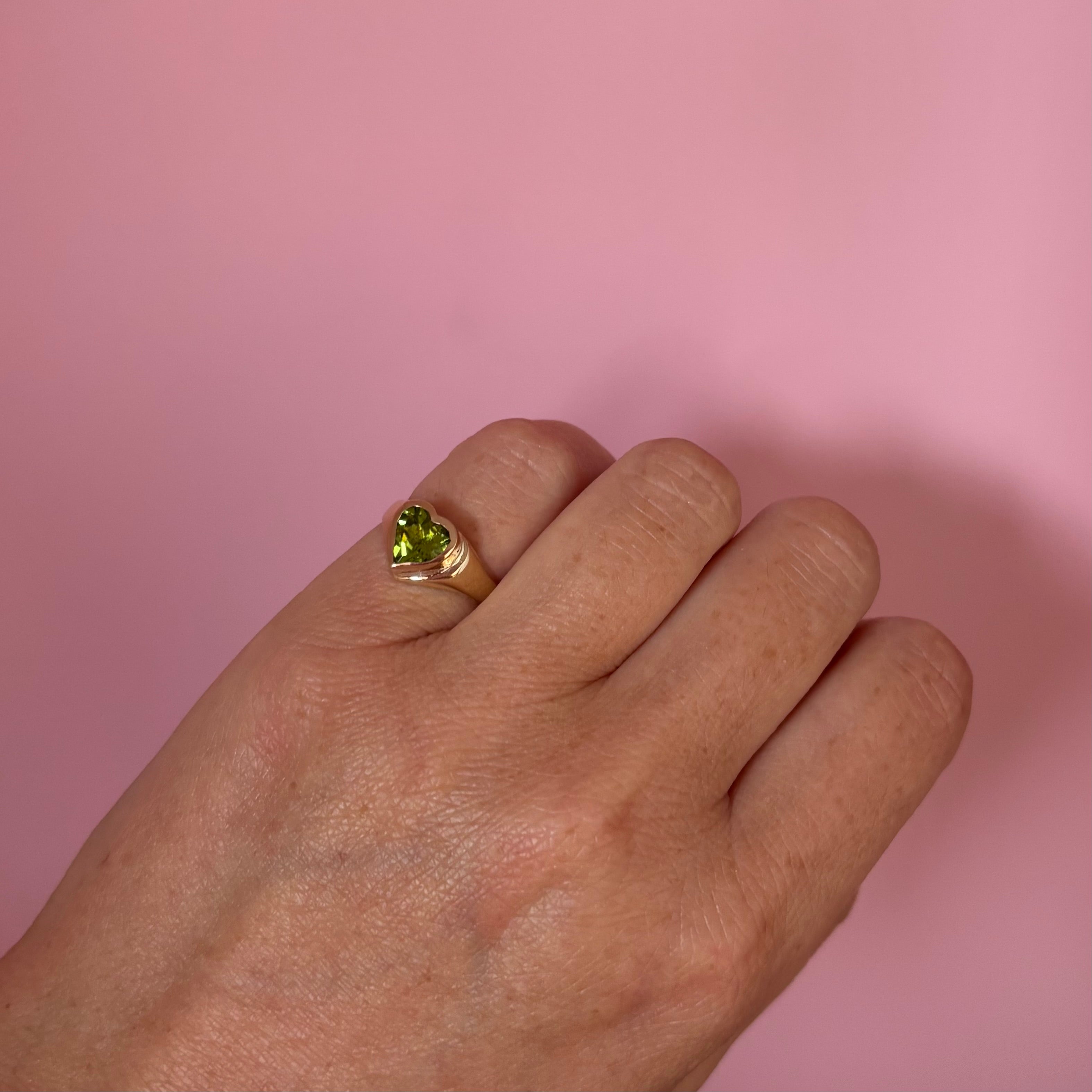 9ct gold bezel set heart shaped peridot signet ring