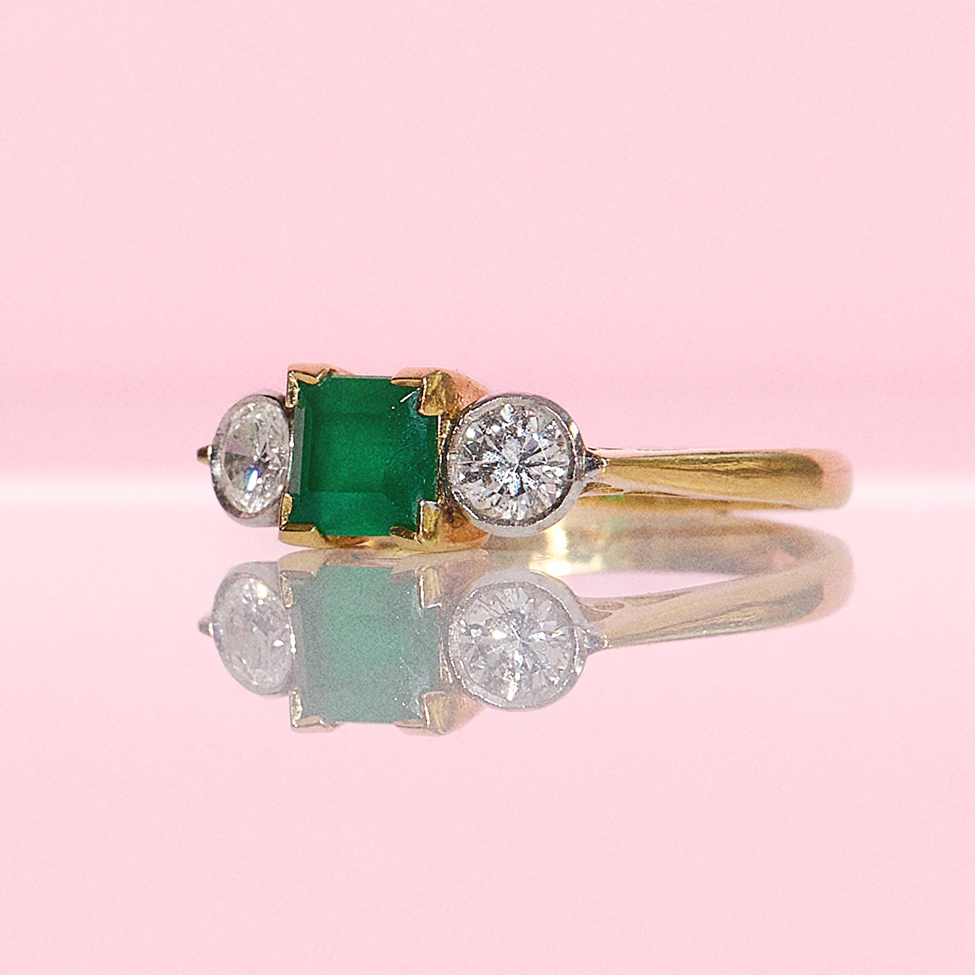 18ct gold square emerald and diamond three stone ring