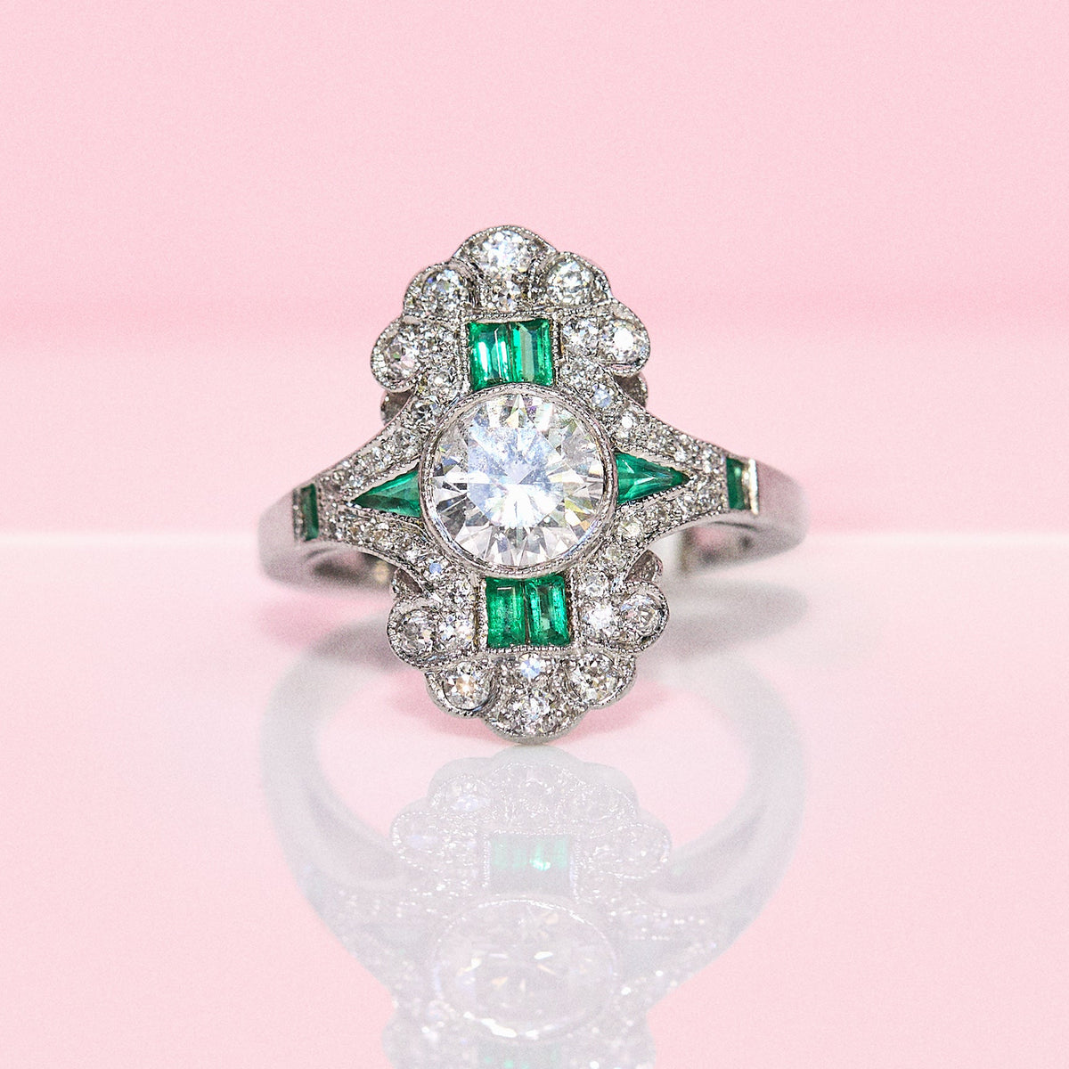 Vintage 18ct white gold emerald and diamond fancy cluster ring