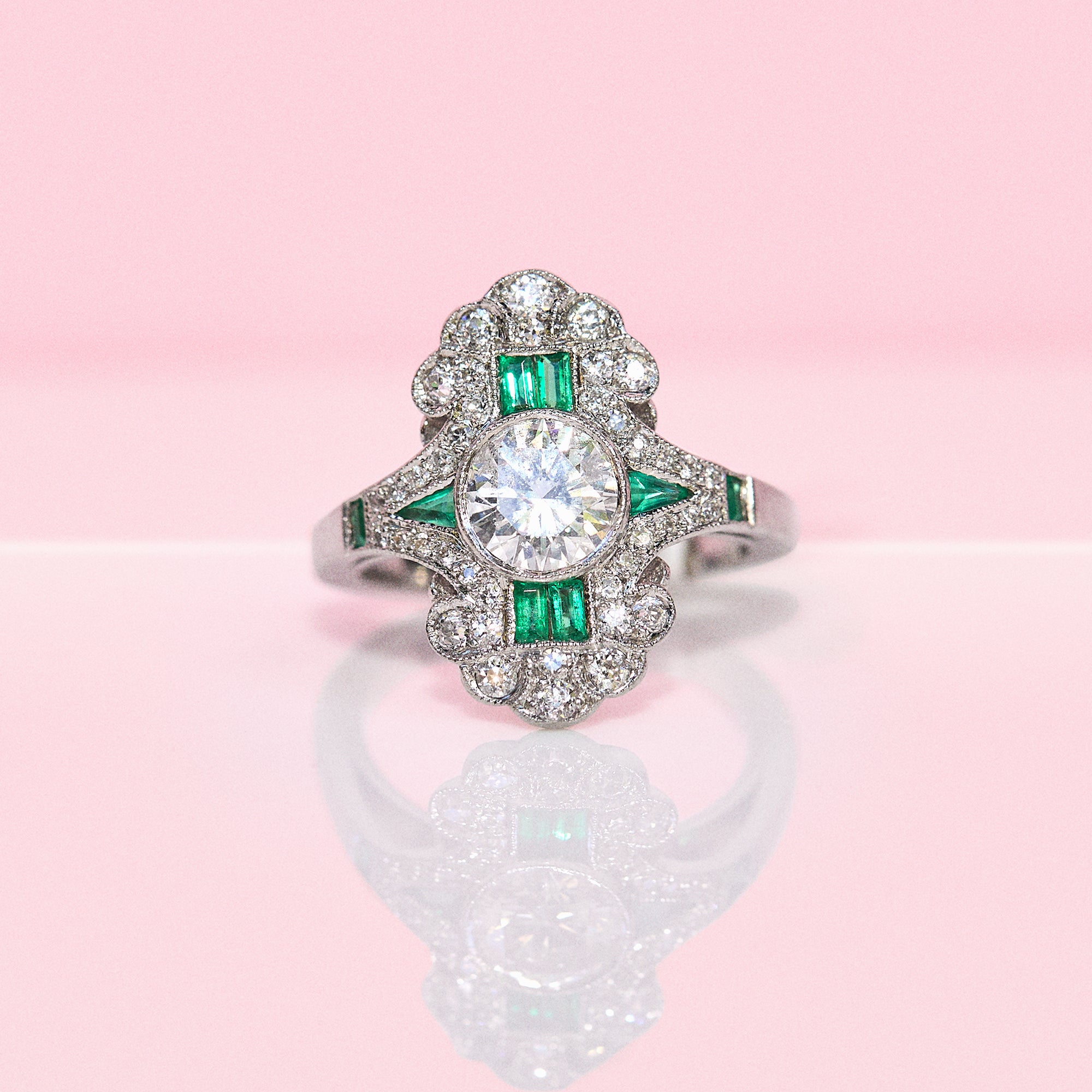 18ct white gold emerald and diamond fancy cluster ring