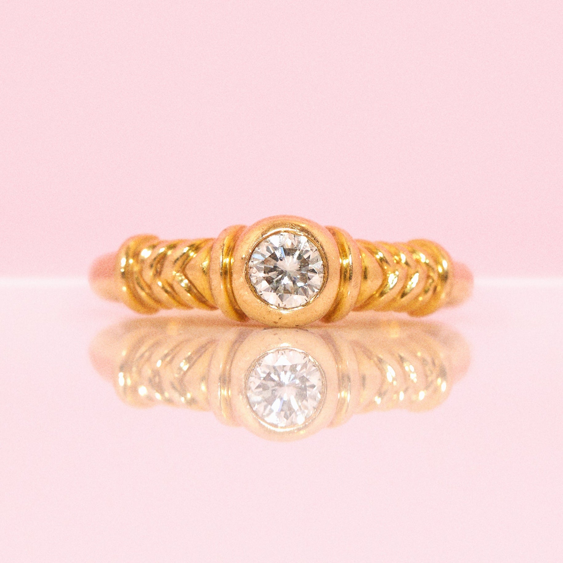 Vintage 18ct gold bezel set solitaire diamond ring