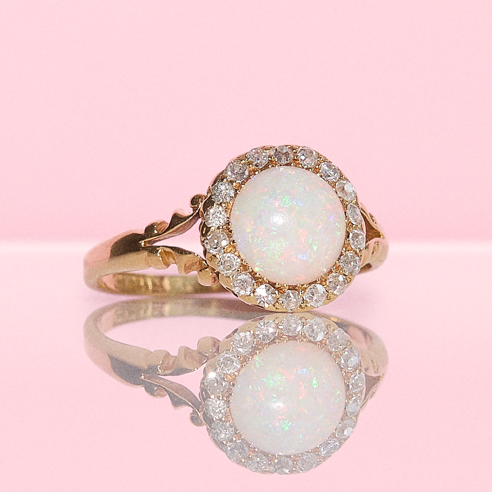 18ct gold round opal and diamond cluster ring