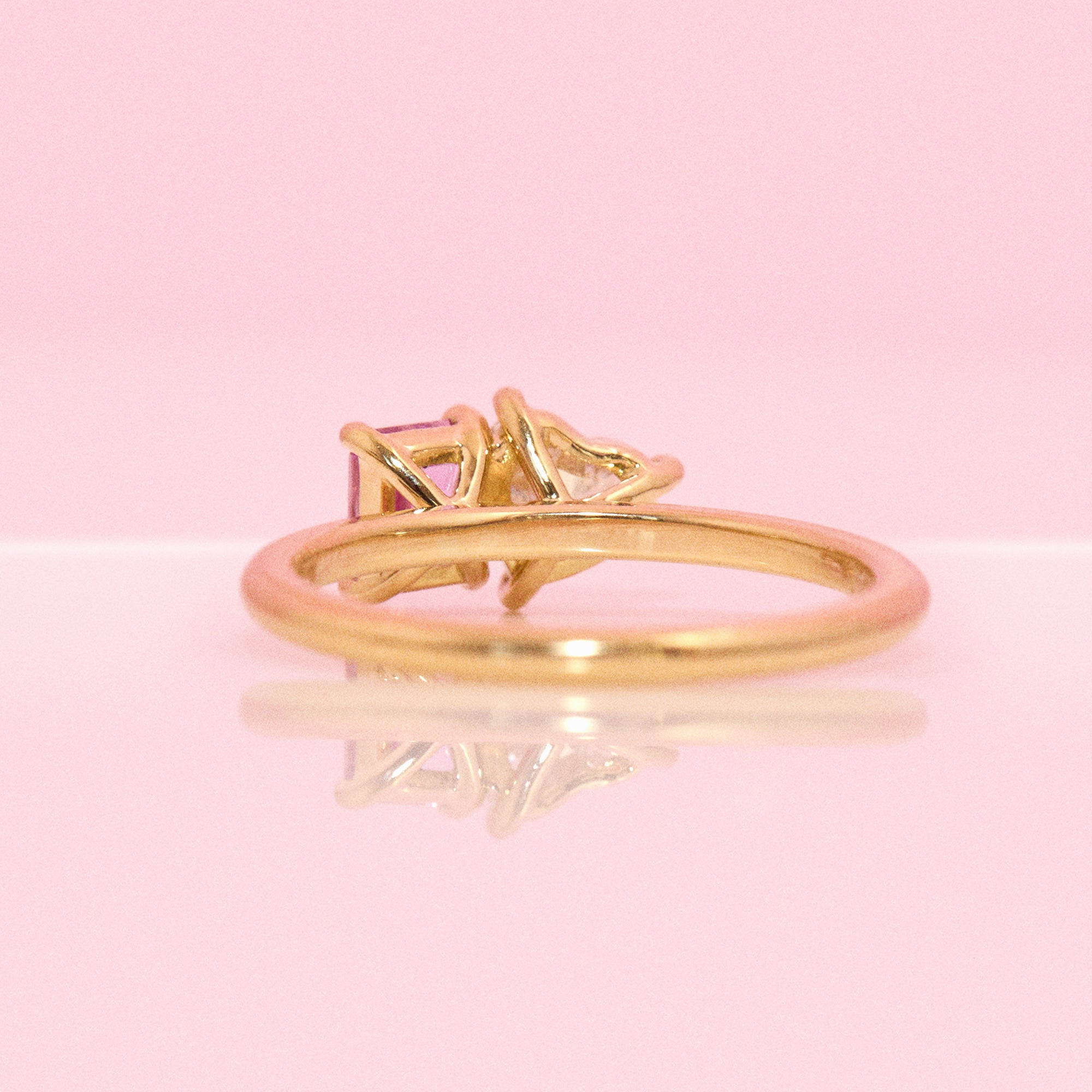 18ct gold ‘toi et moi’ 0.46ct heart-shaped diamond and 0.60ct pink sapphire ring