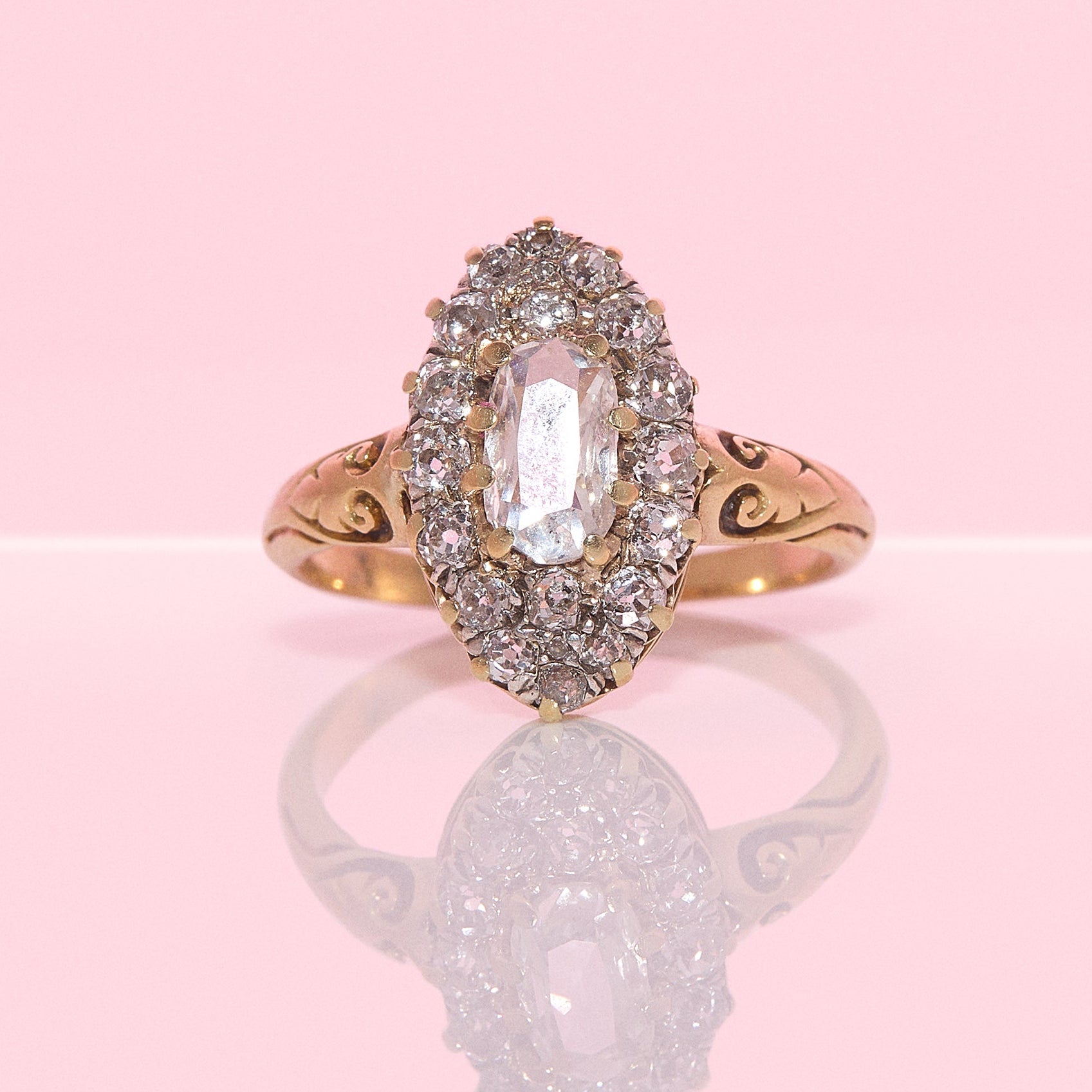 18ct gold 0.5ct old oval diamond marquise cluster ring