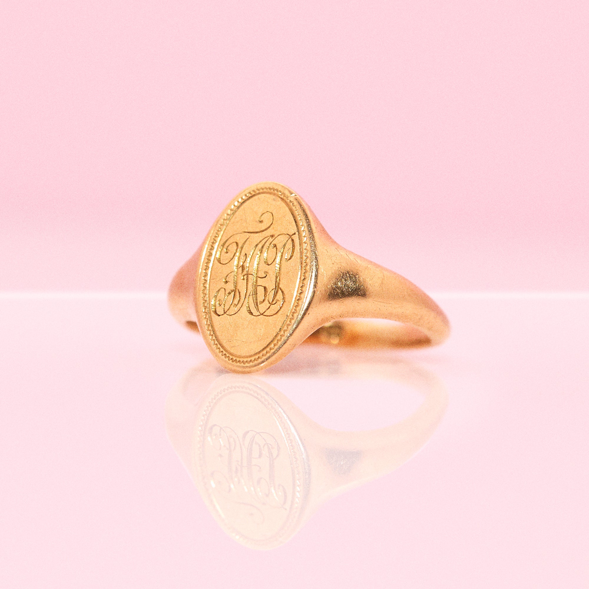 18ct gold engraved oval signet ring