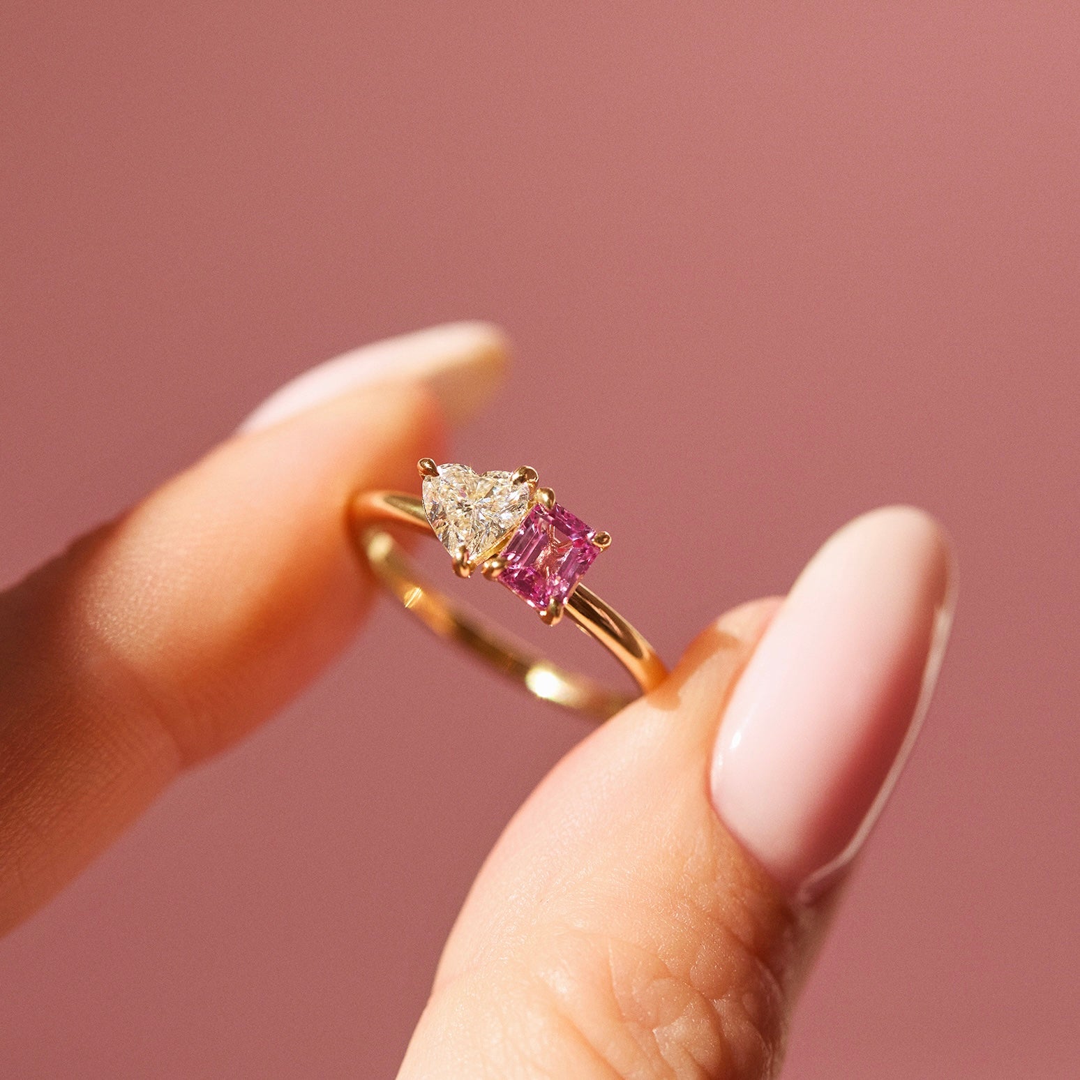 18ct gold ‘toi et moi’ 0.46ct heart-shaped diamond and 0.60ct pink sapphire ring