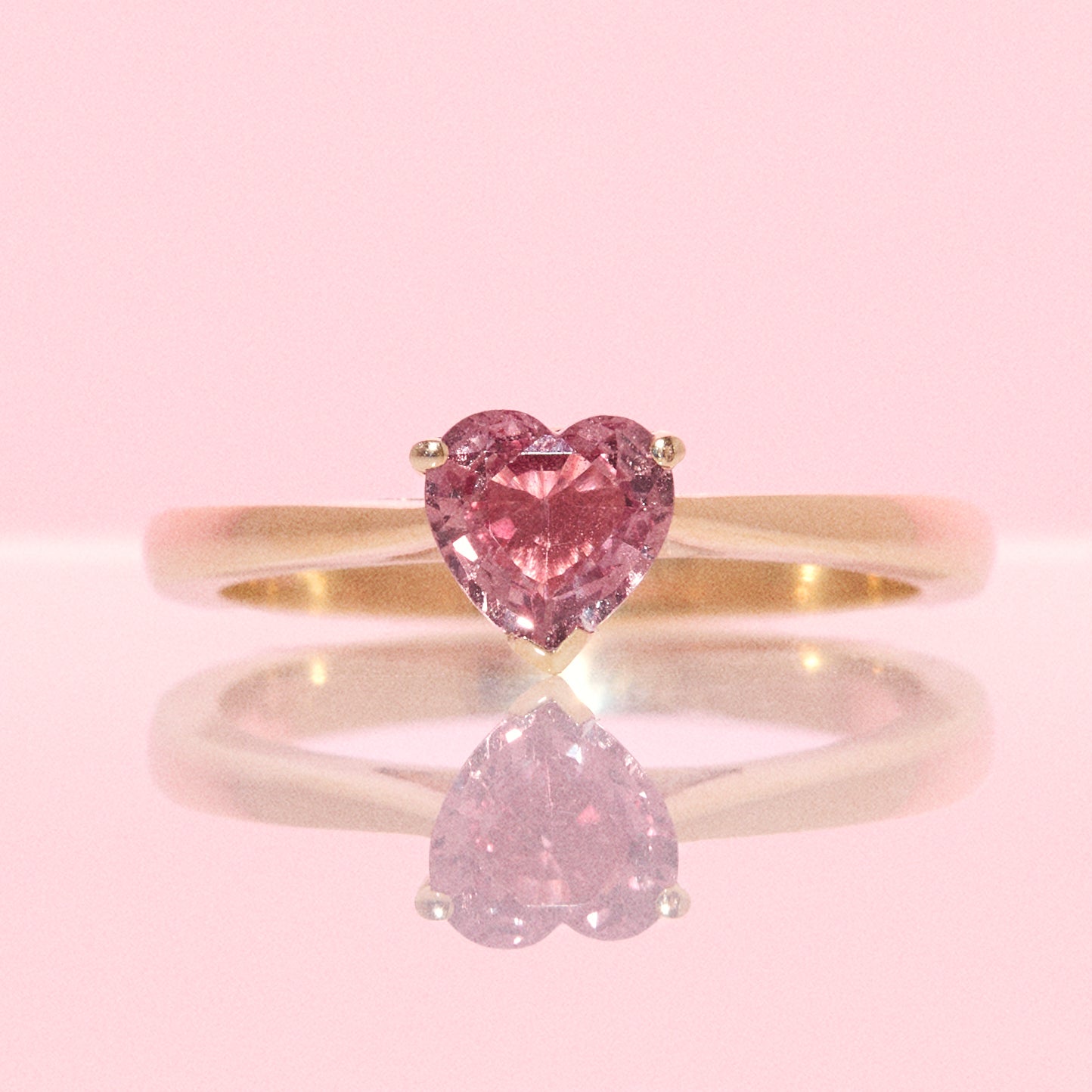 9ct gold heart shaped 0.90ct pink sapphire ring