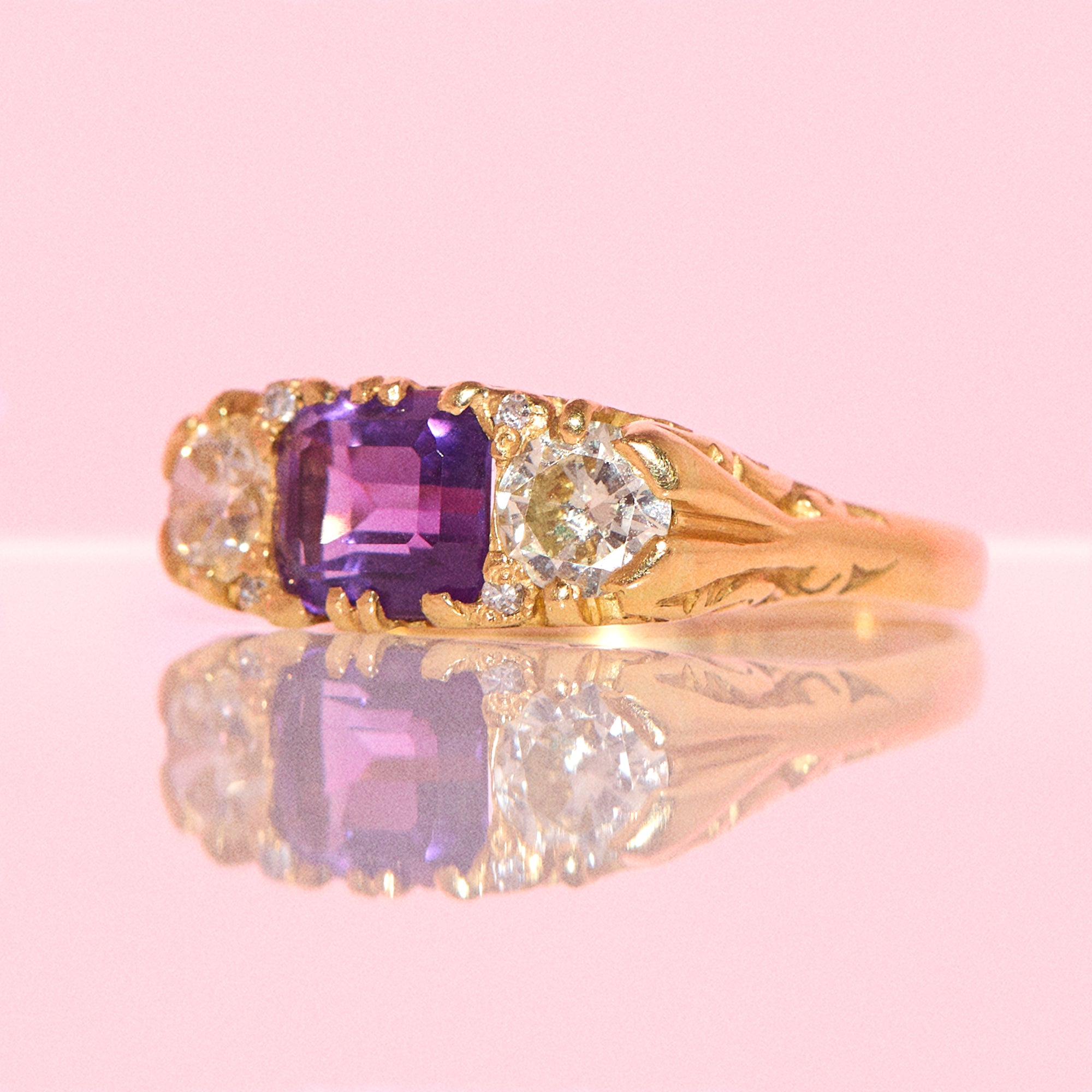 Vintage 18ct gold east to west amethyst and diamond carved ring