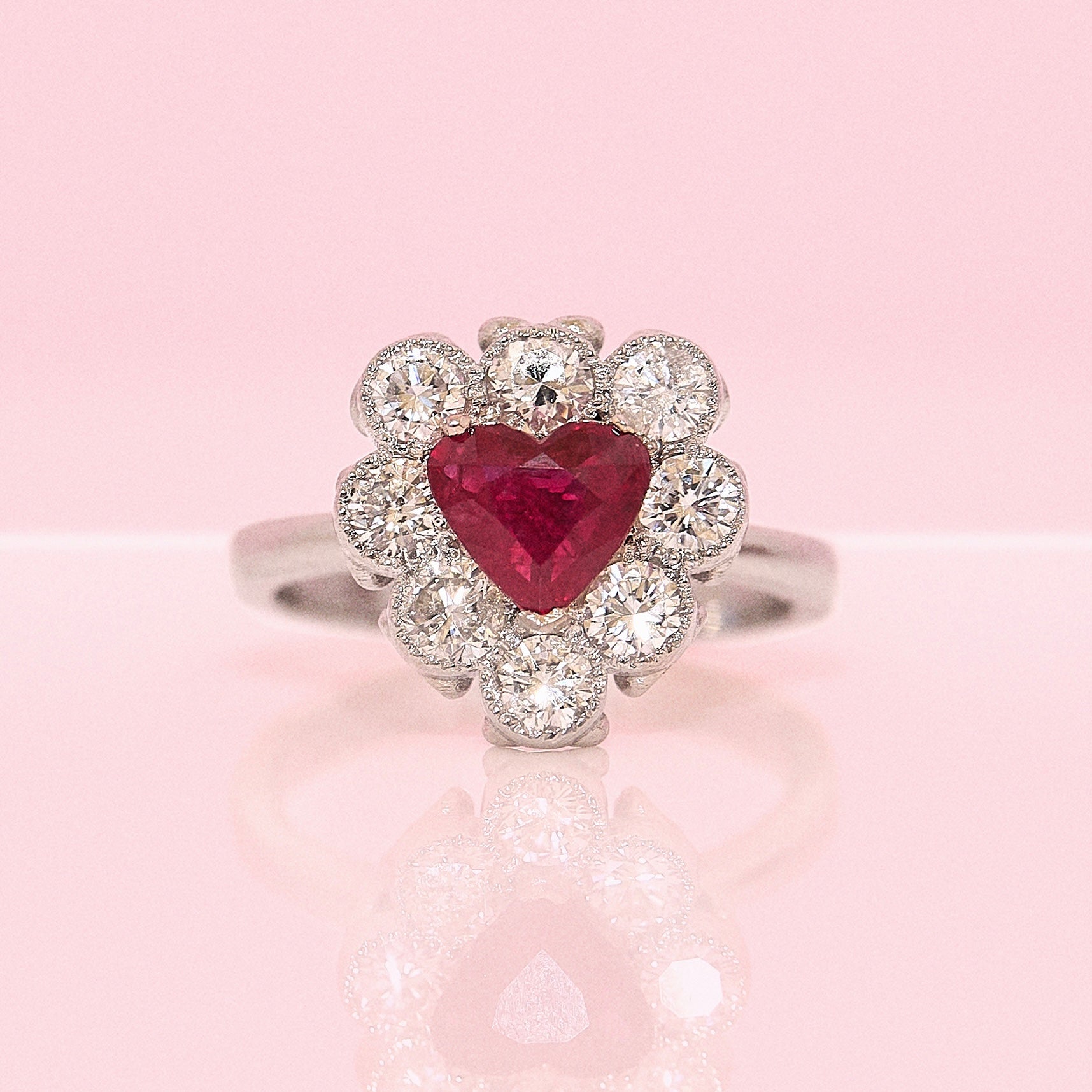 Platinum heart-shaped ruby and diamond vintage earring conversion ring