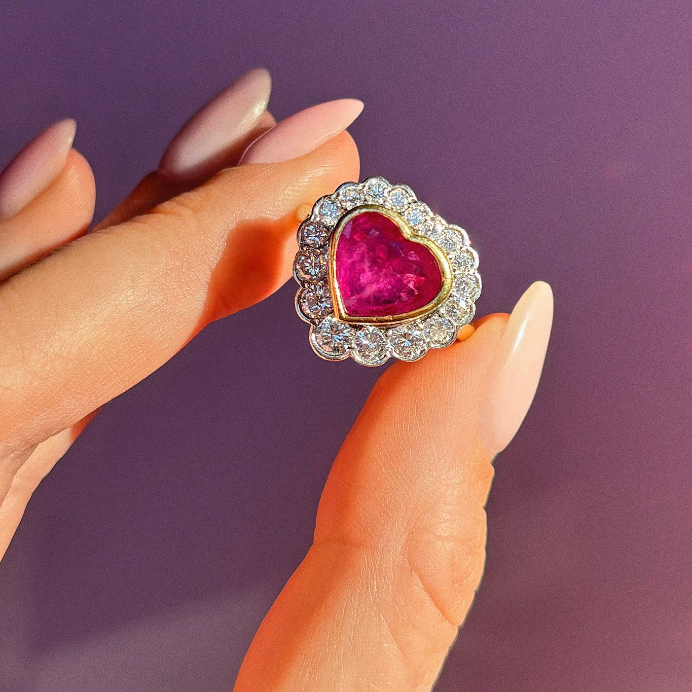 18ct gold 2.15ct bezel set heart-shaped Burma ruby and diamond cluster ring