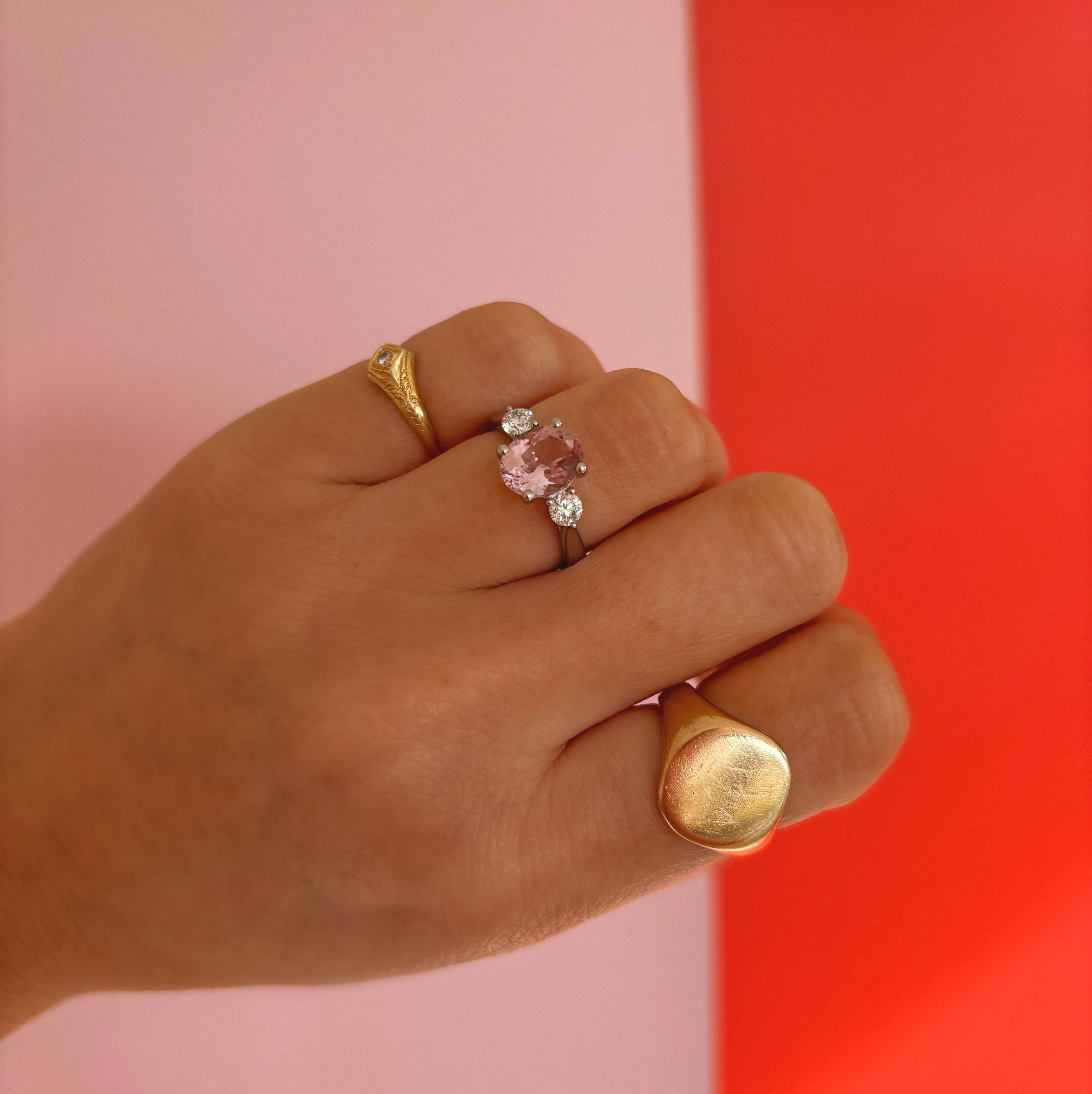 Platinum morganite and diamond three stone ring