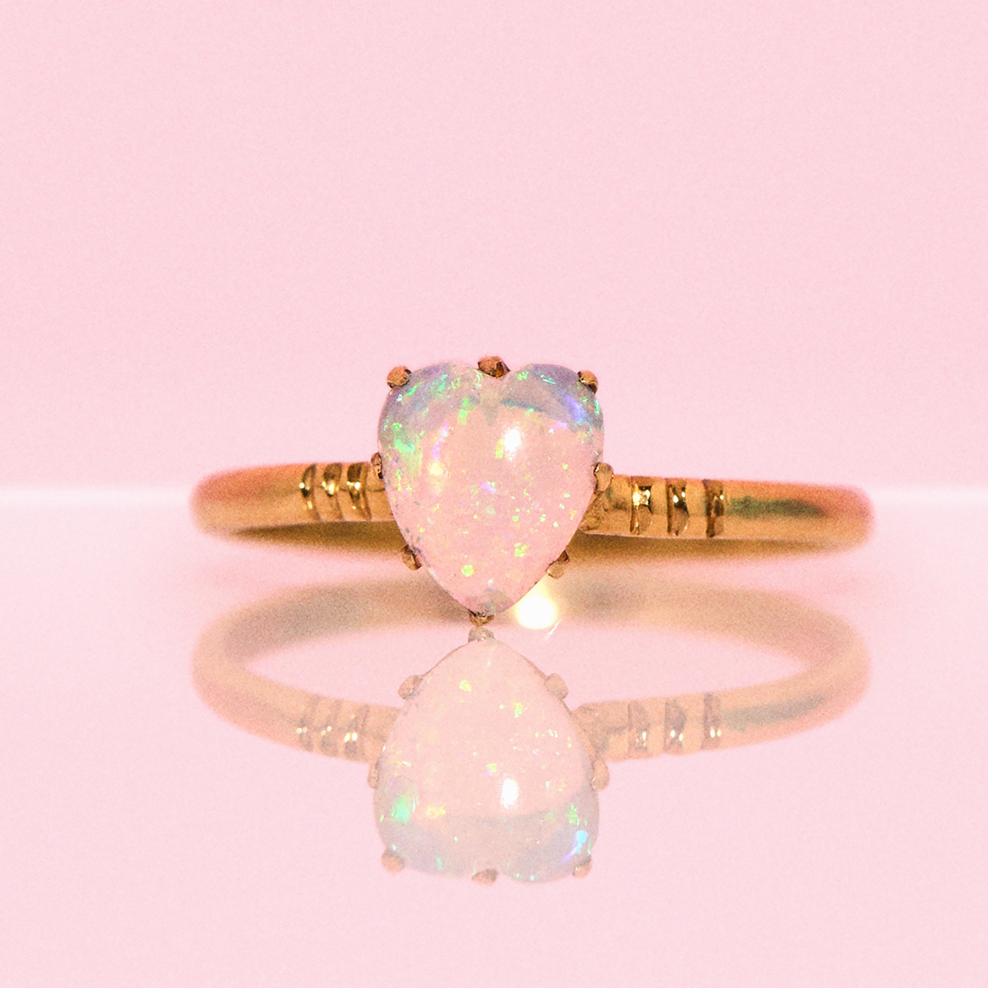 18ct gold heart shaped opal ring