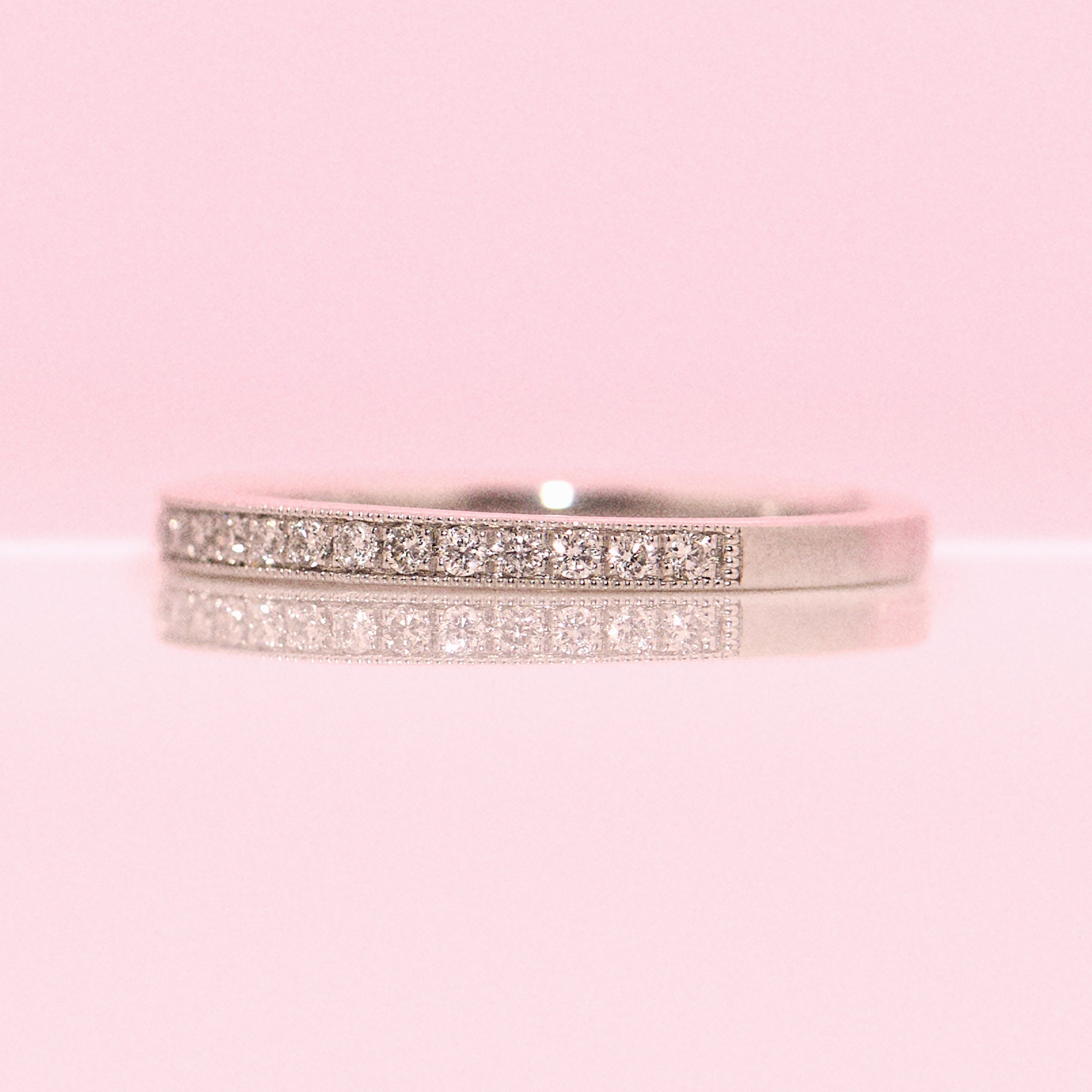 Platinum 0.20ct diamond half-eternity ring