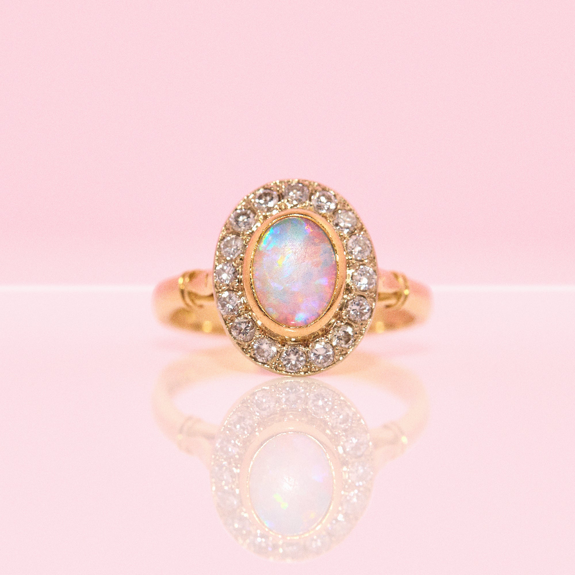 18ct gold bezel set opal and diamond ring from 1993