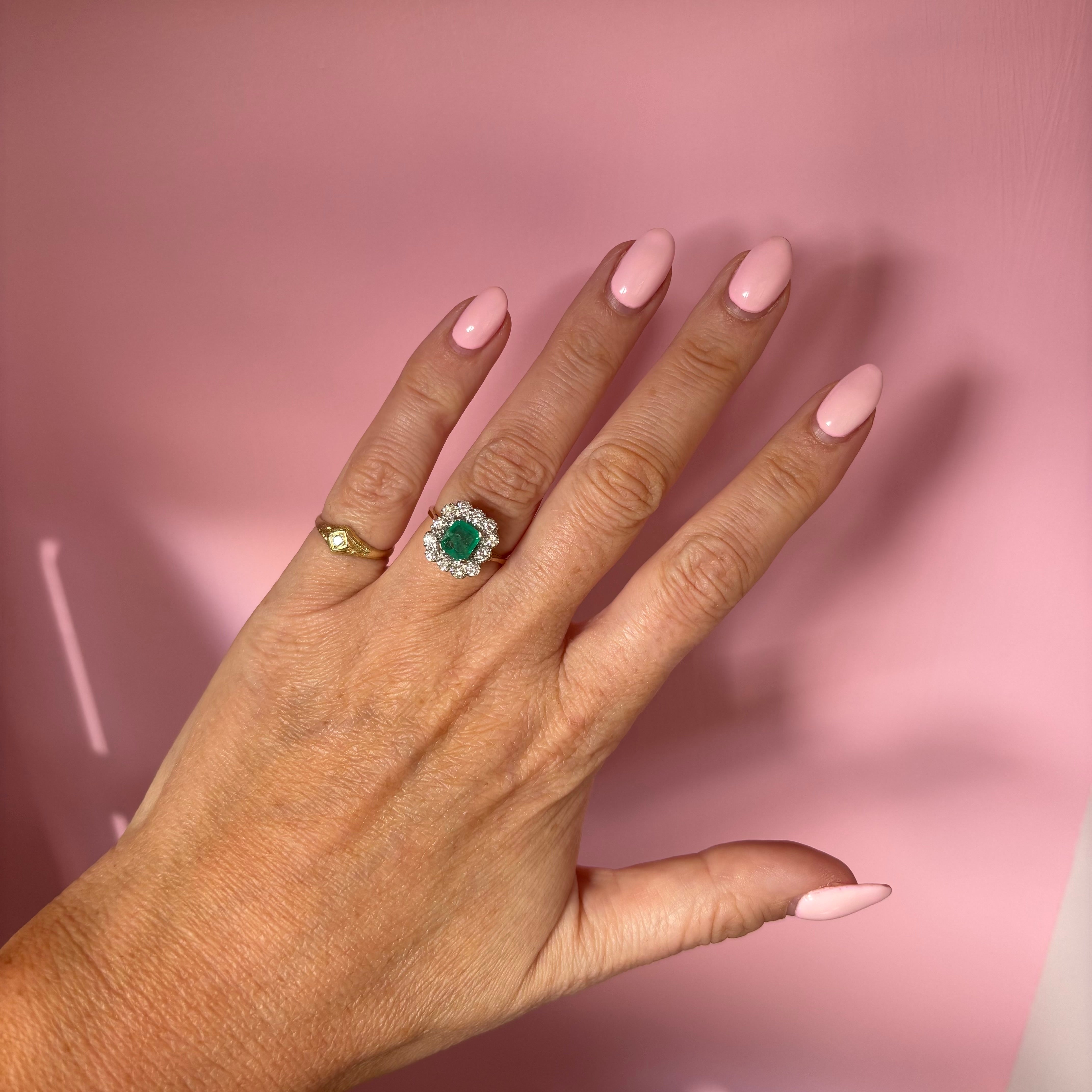 18ct gold emerald and diamond cluster ring