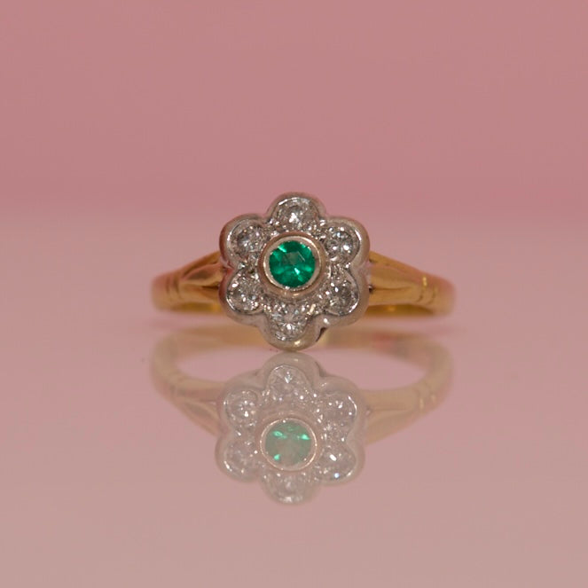 18ct gold emerald and diamond flower ring