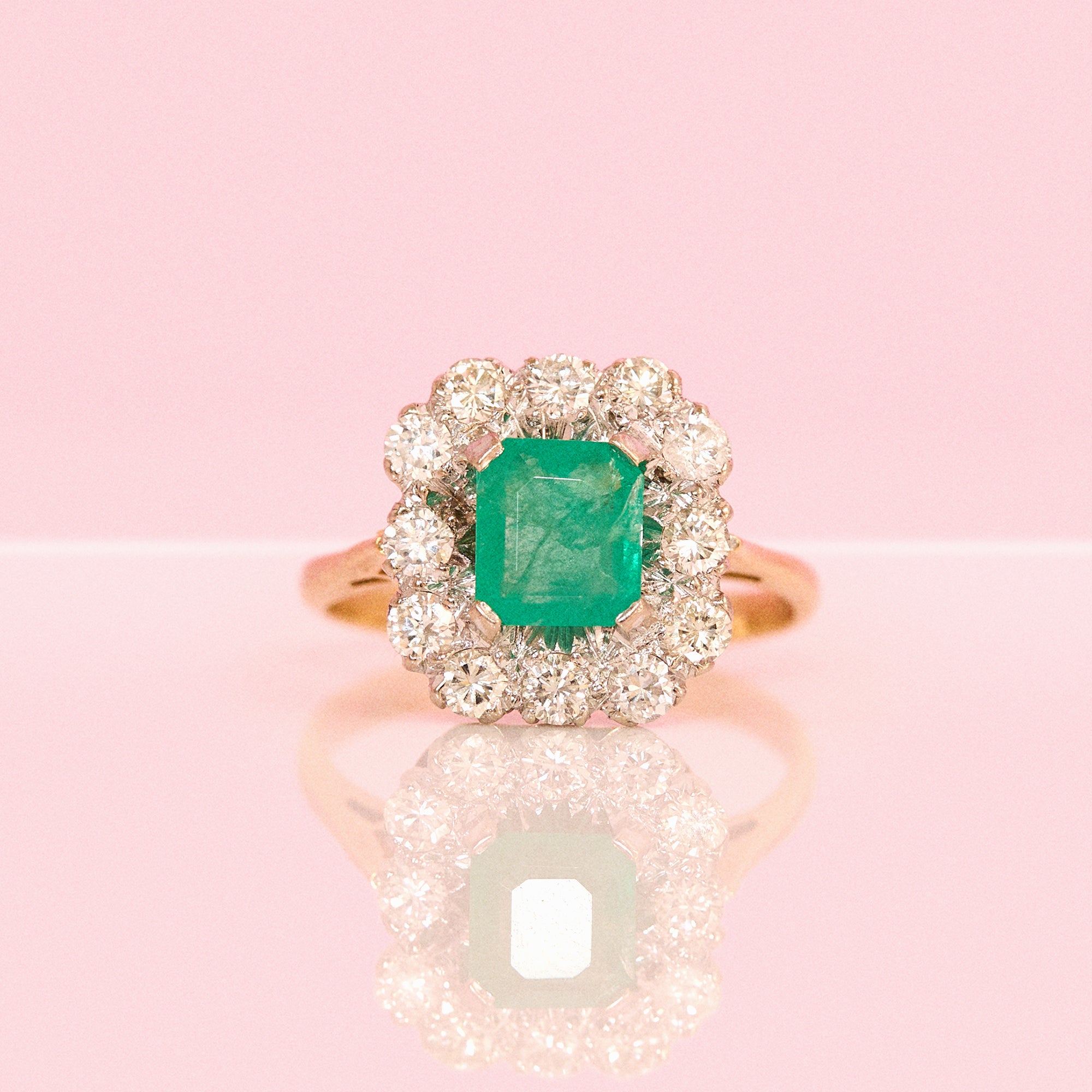 18ct gold emerald and diamond cluster ring