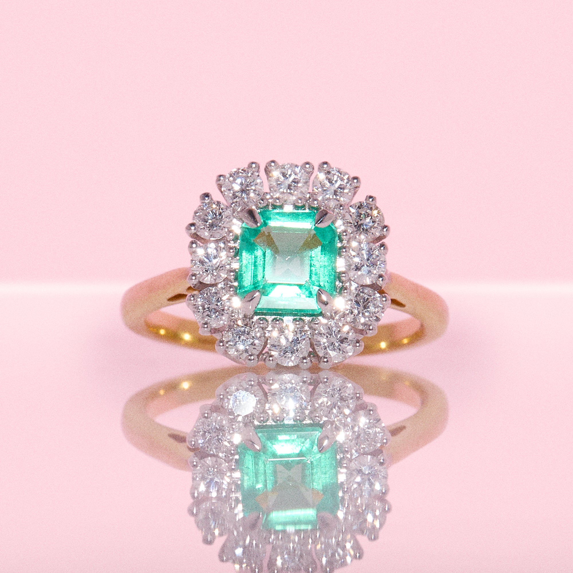 18ct gold emerald and diamond cluster ring