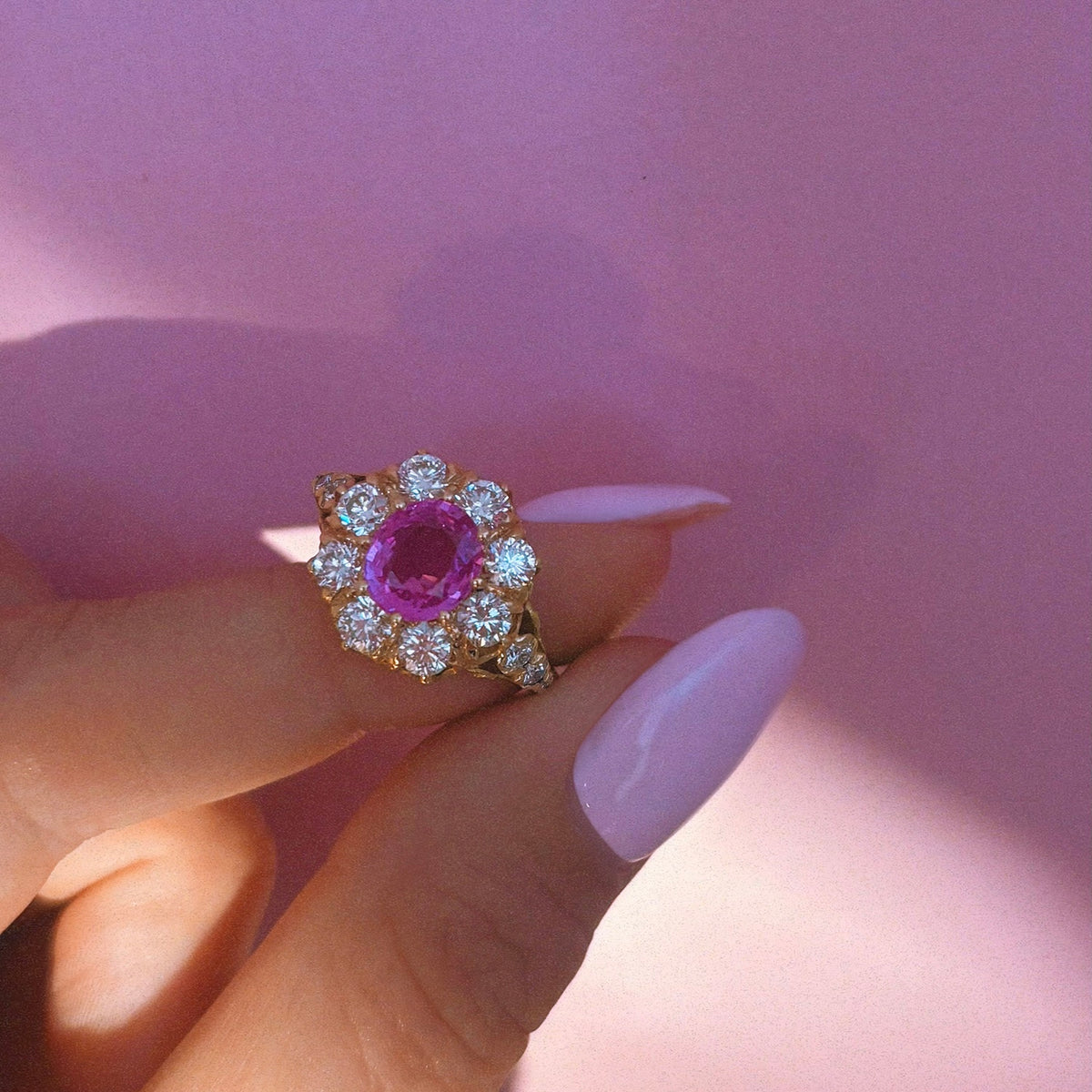 Vintage 18ct gold 1.16ct oval pink sapphire and 1.0ct diamond cluster ring